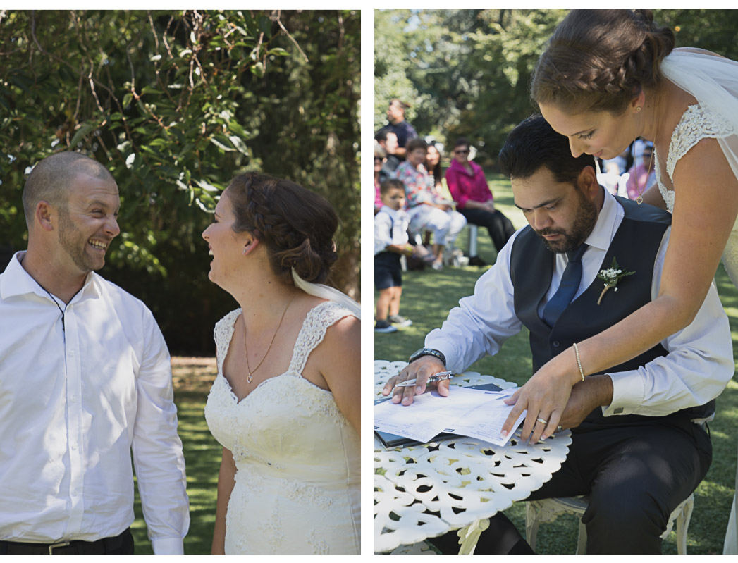 bride and groom during wedding ceremony signing register