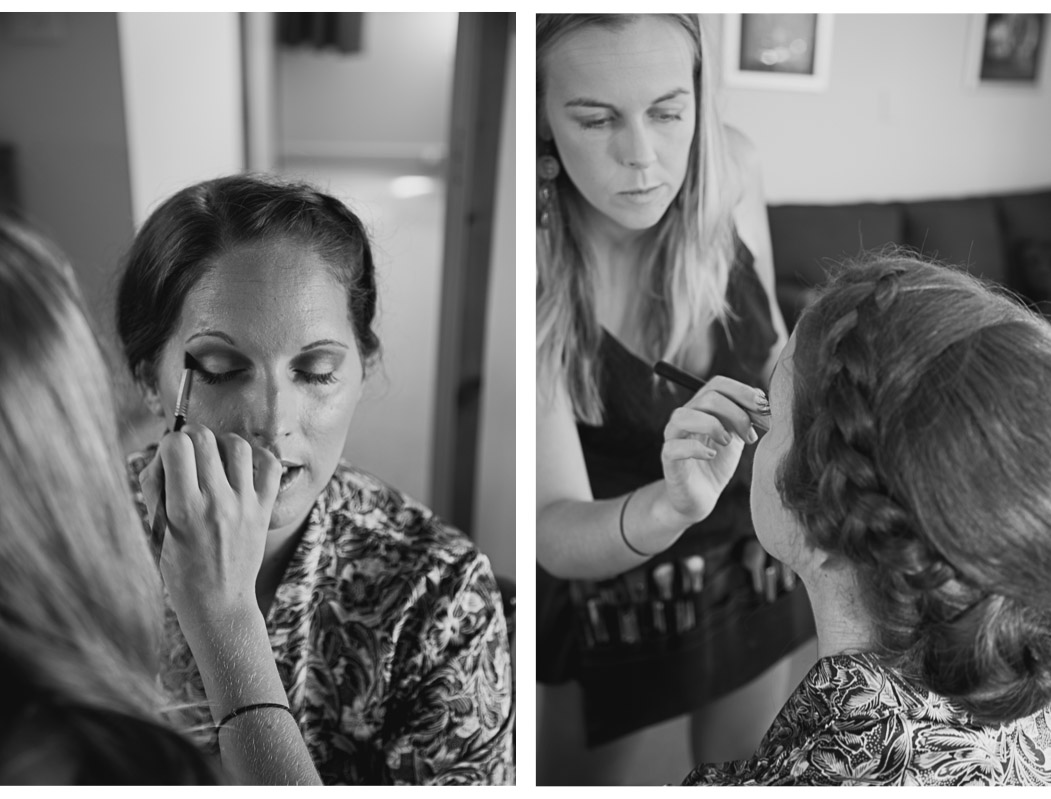bride having makeup done on wedding day