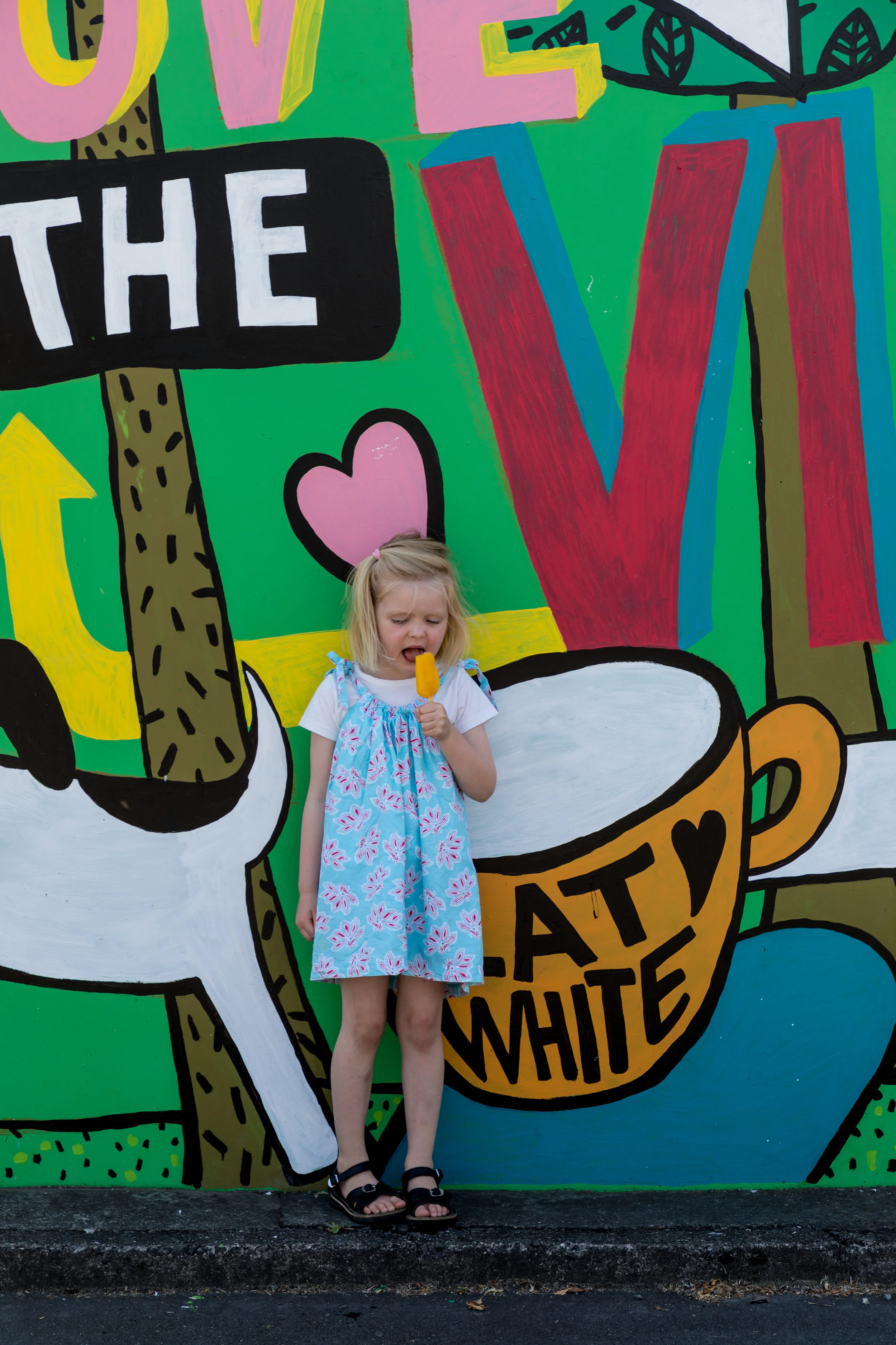 little-girl-eating-henrys-ice-block.jpg