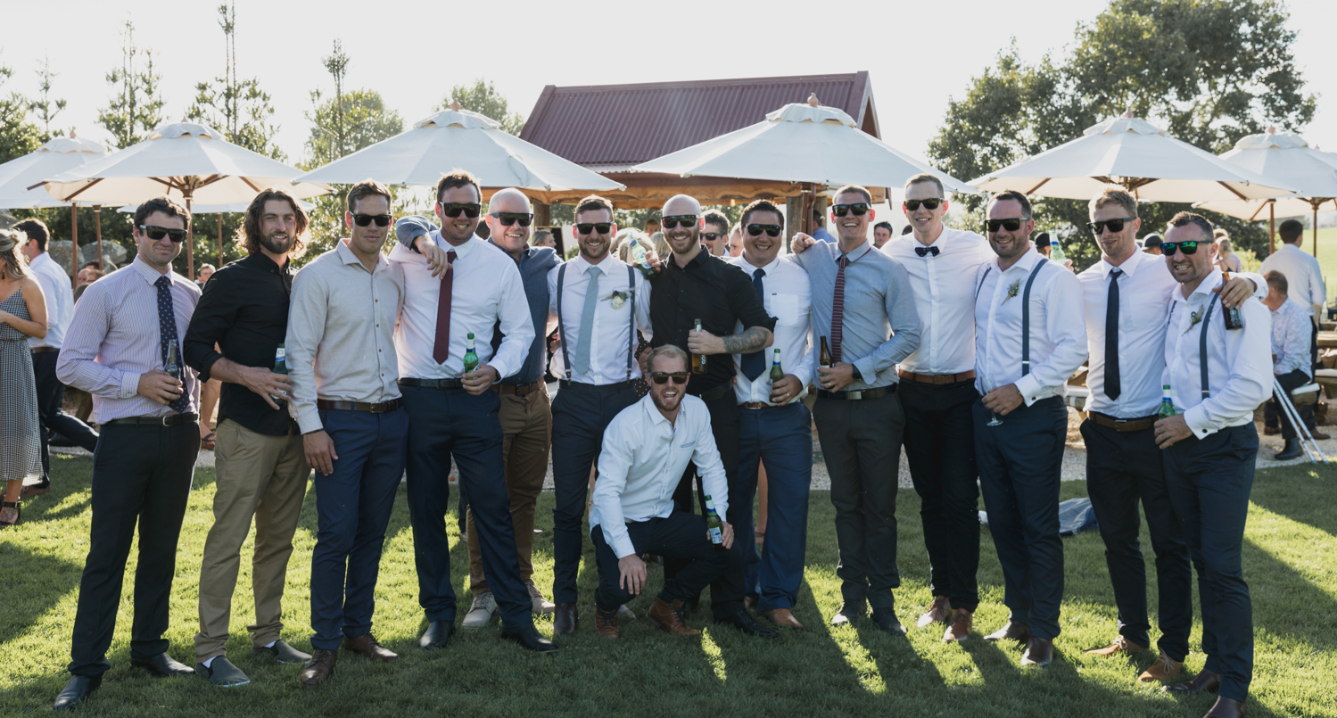 wedding-at-the-red-barn-new-zealand-wedding-photographer-groom-with-all-his-friends.jpg