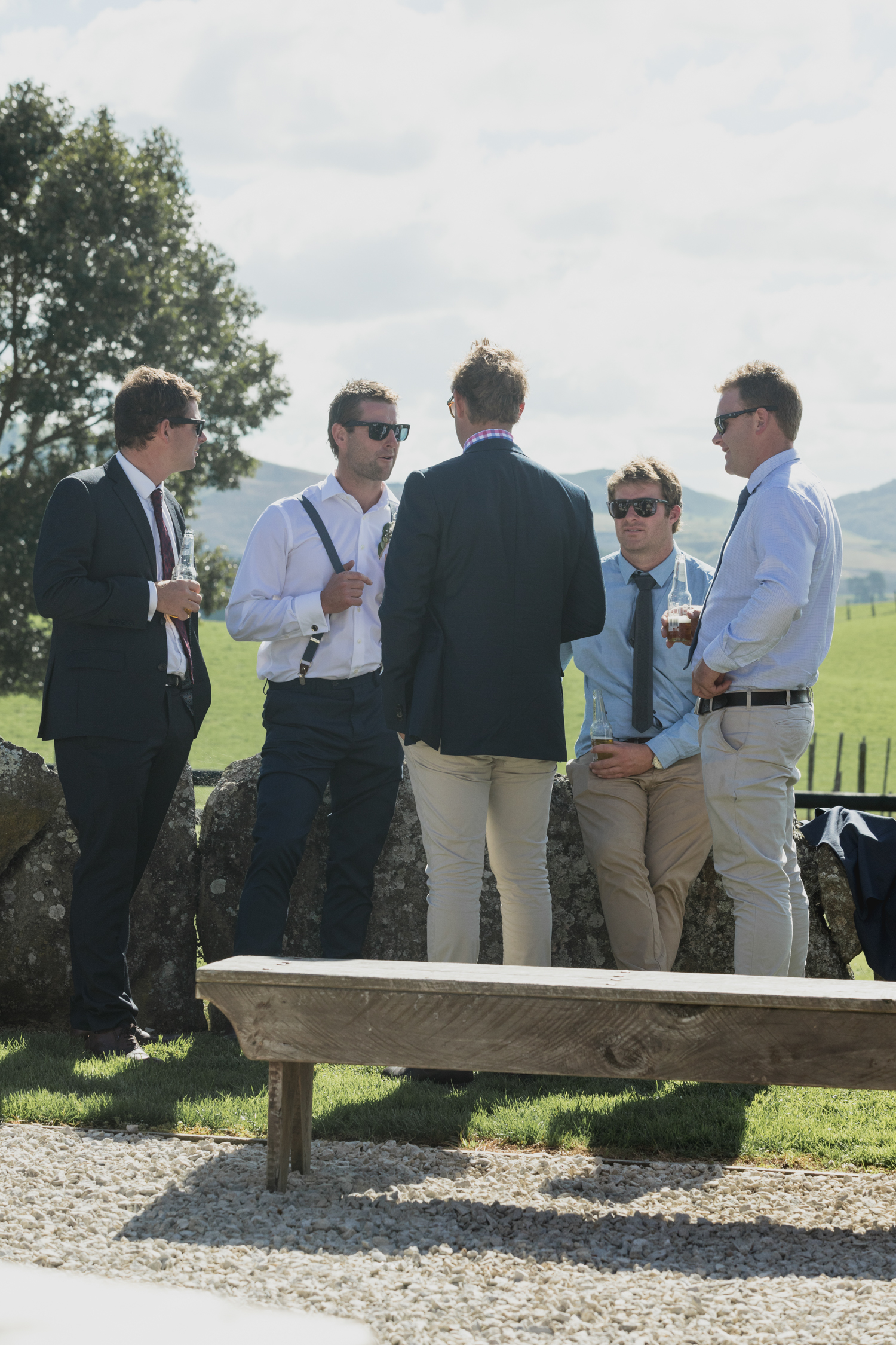 wedding-at-the-red-barn-new-zealand-wedding-photographer-the-boys-yarning.jpg
