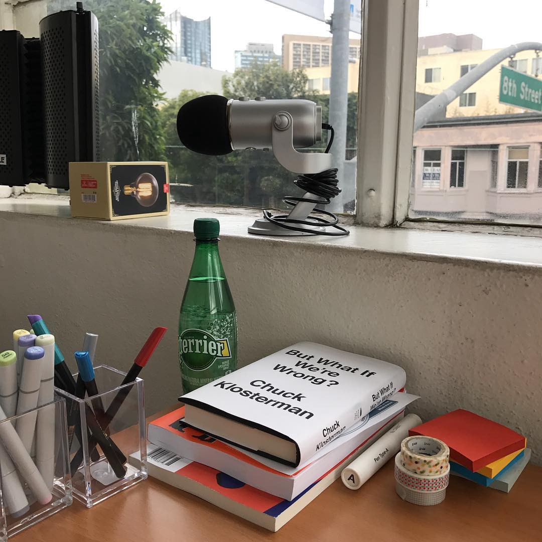 Books piled up at Should We’s studio space . I do most of my reading on Kindle, but I like a few books in my peripheral vision.