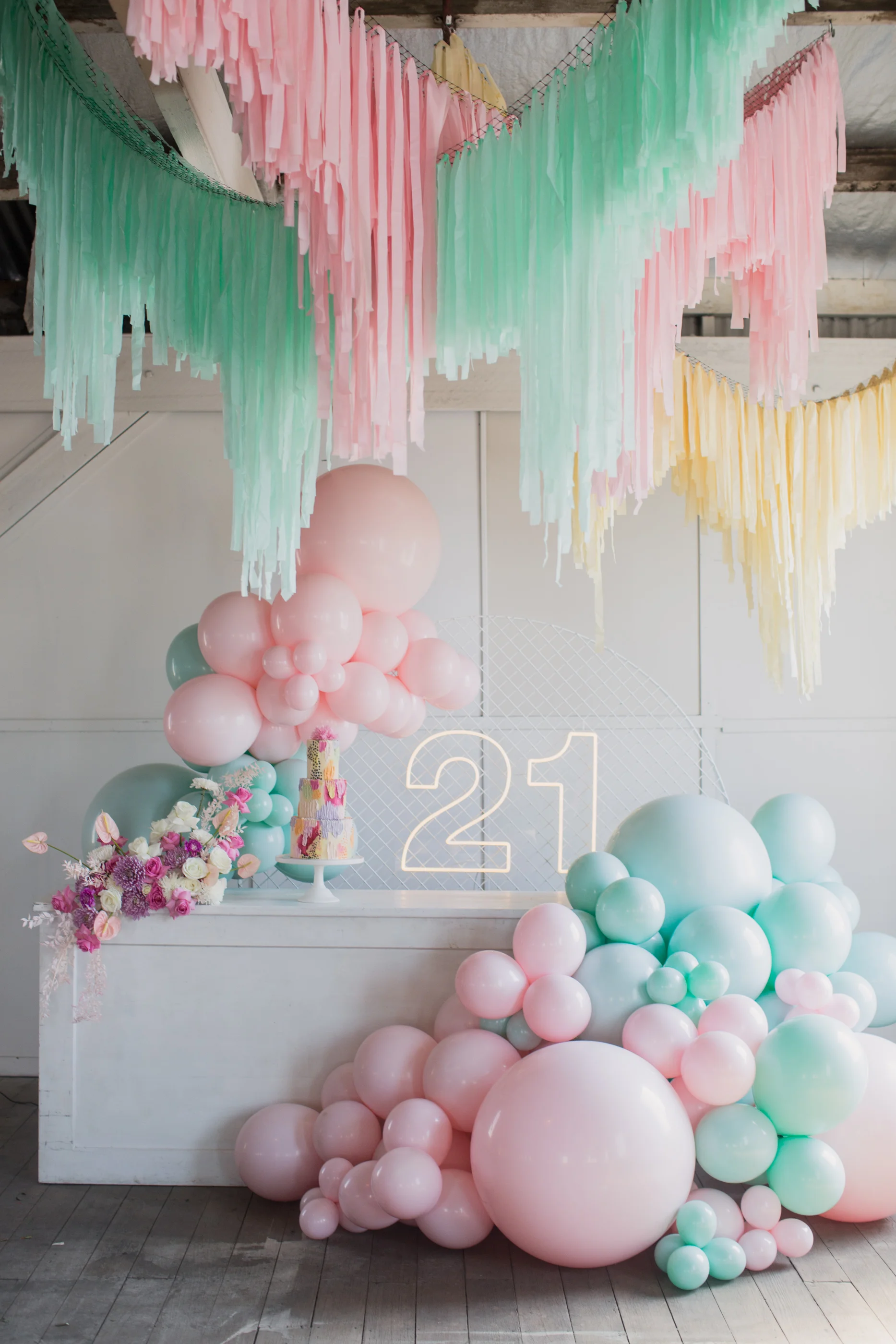 Neon Little Pineapple Neon, Balloons by Moonshot Balloons Hanging instal by Banging Hangins, Mesh screen by Shape Steel Cake by Made About Cake