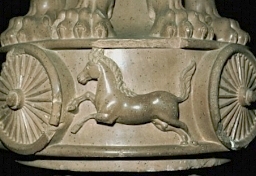 Horse motif on base