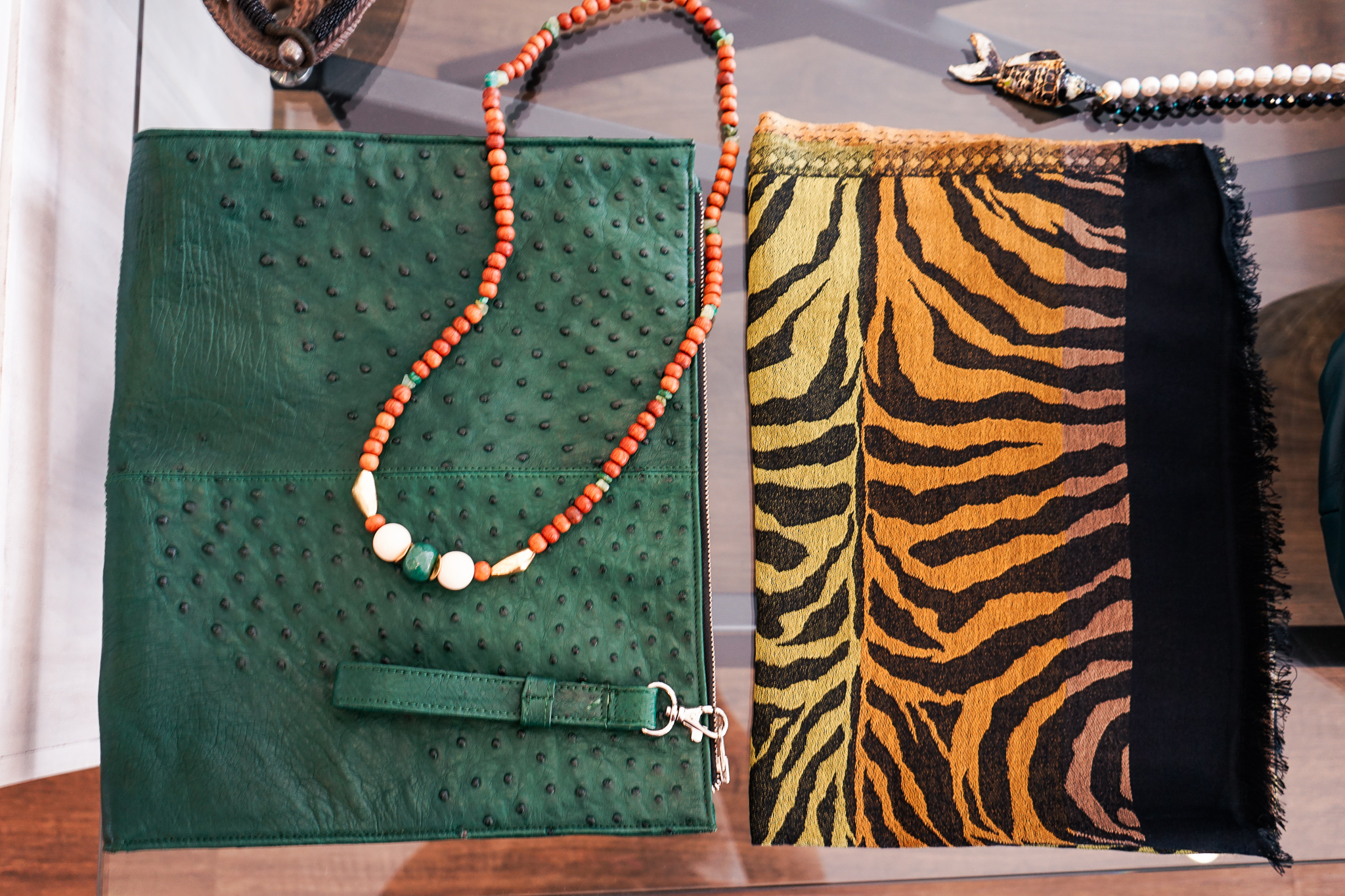 Ostrich leather clutches at L'Atelier Touche