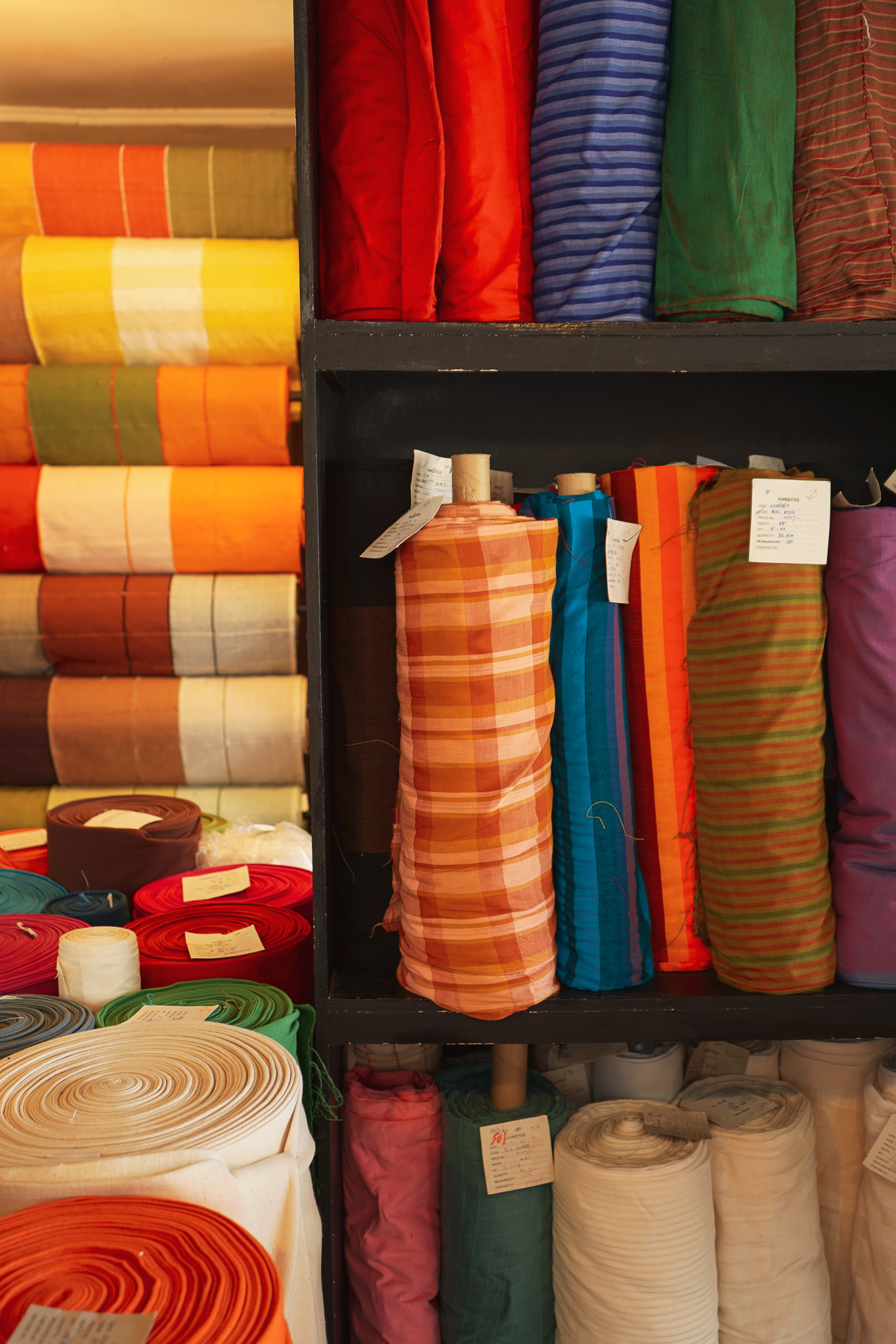Handloom fabric rolls at Kandygs