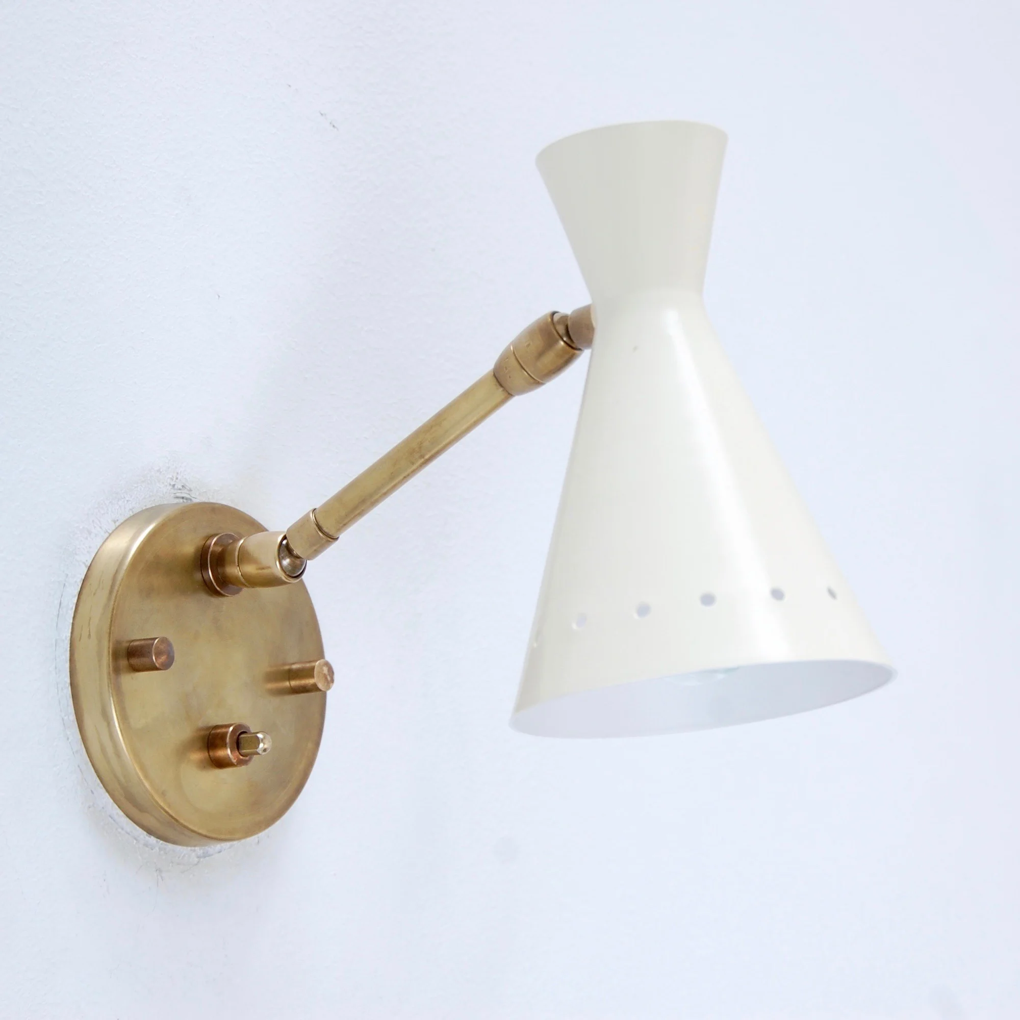 PerforatedArticulatedSconces11.jpg