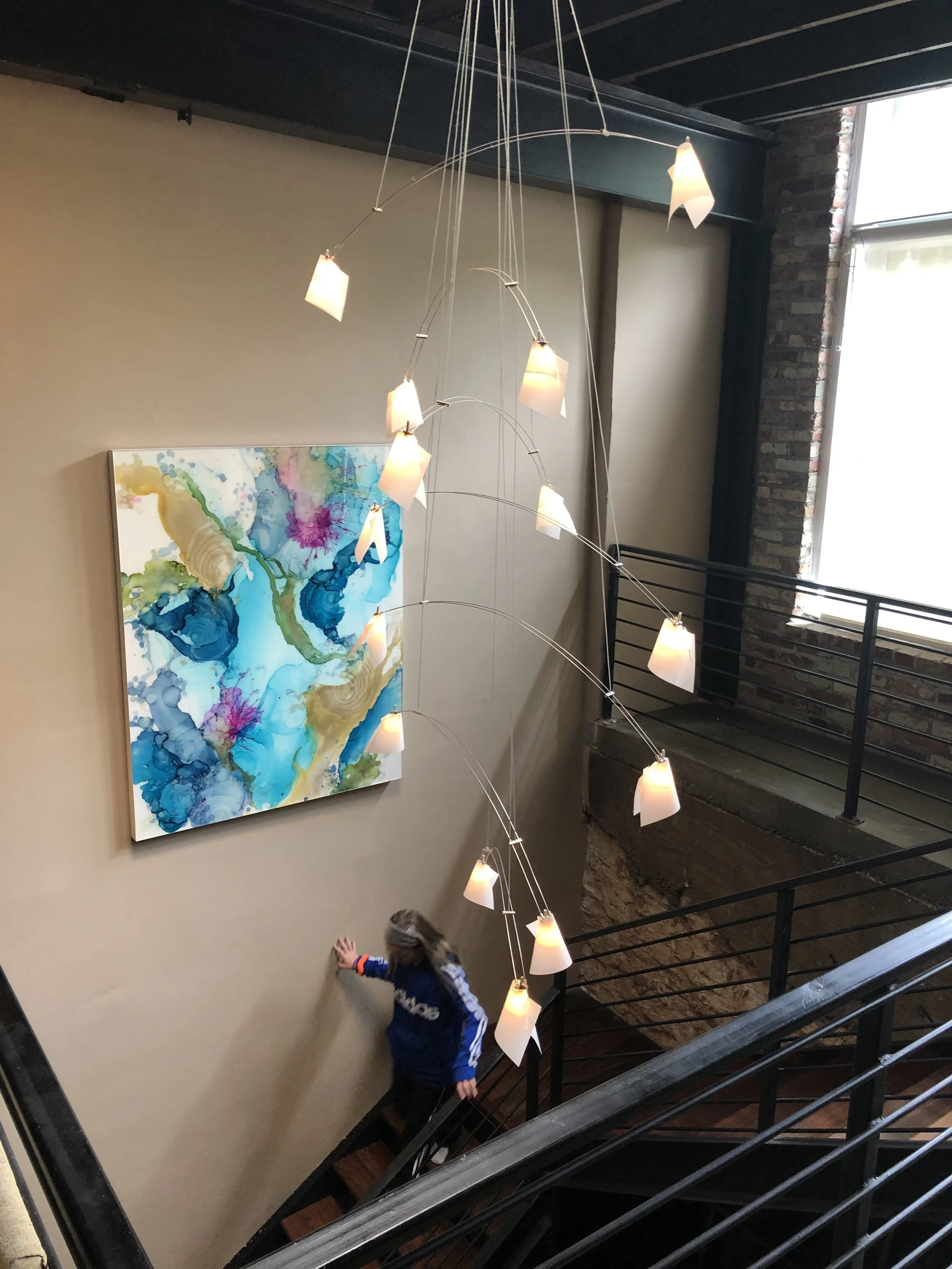 installation of summertime rolls mixed media resin art by north carolina artist amanda moody