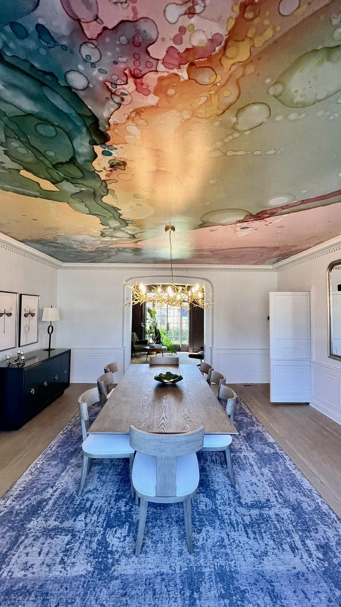 Amanda Moody of Bombshelves Jawbreaker wallpaper mural on ceiling of grandfather homes Barnhardt estate in Charlotte NC
