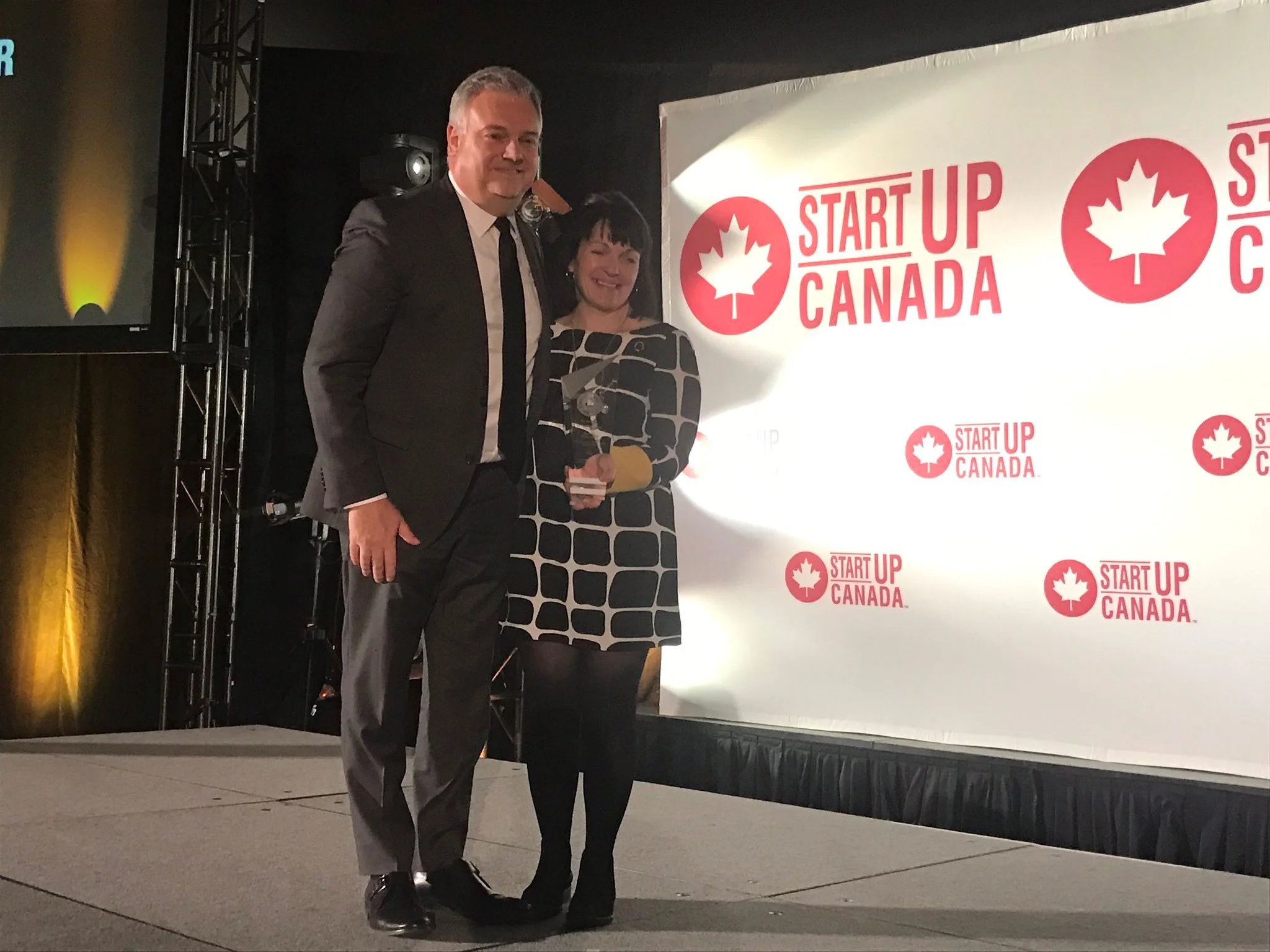 Kari Gordon, Executive Director at Startup Calgary receiving the Startup Canada Community Leader of the Year Award for Western Canada, sponsored by Rogers. Photo: Startup Canada