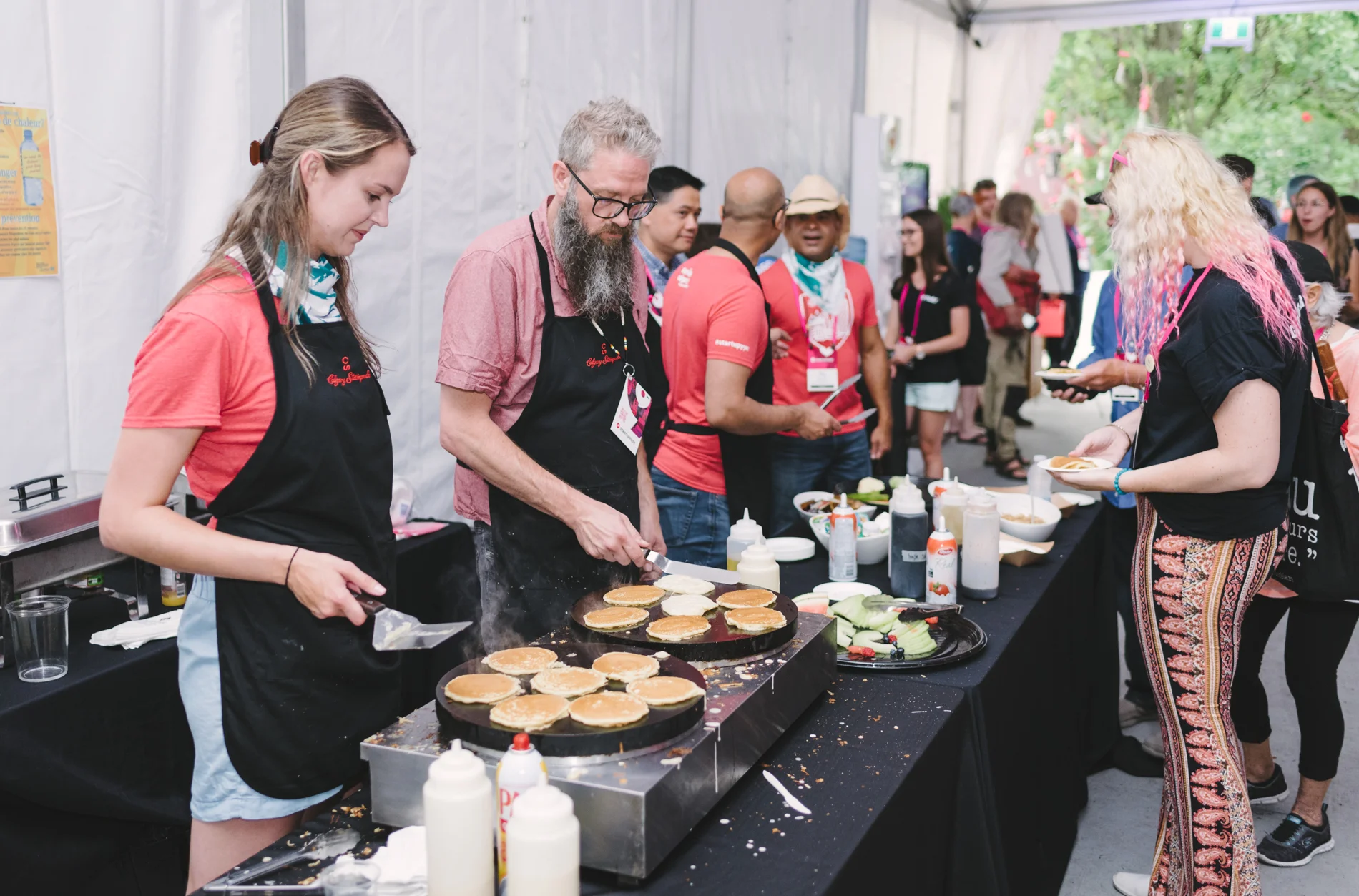 Flipping pancakes left to right: Danielle Torrie, Dave Cree (CMNGD), Bilal Rasool & David Yiptong (Platform Calgary), Jay Maharaj (community member). Photo credit: Click Flash Photography