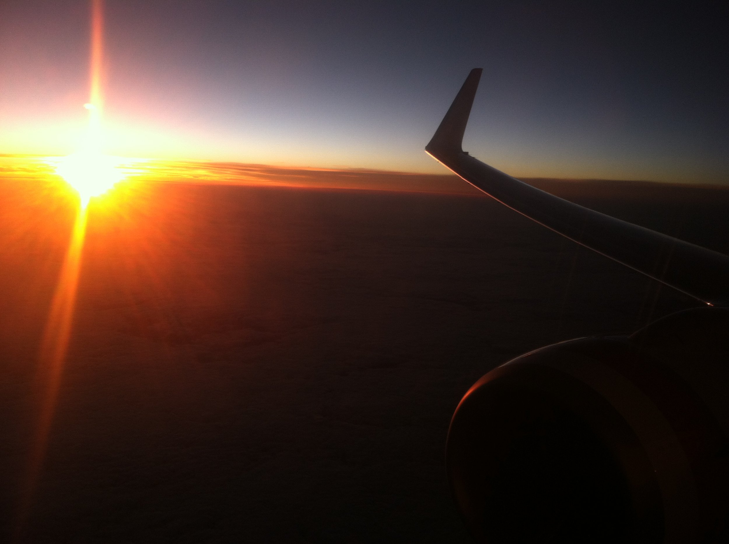 Flying to New Zealand at sunset