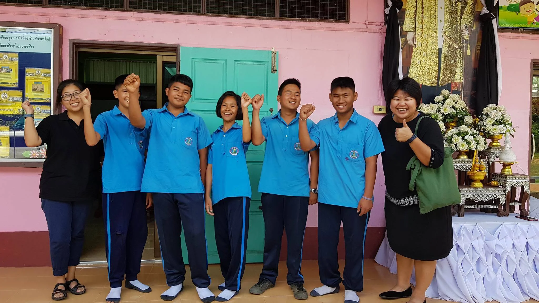 Pakou (left), her students, and Peace Corps TH Program Assistant