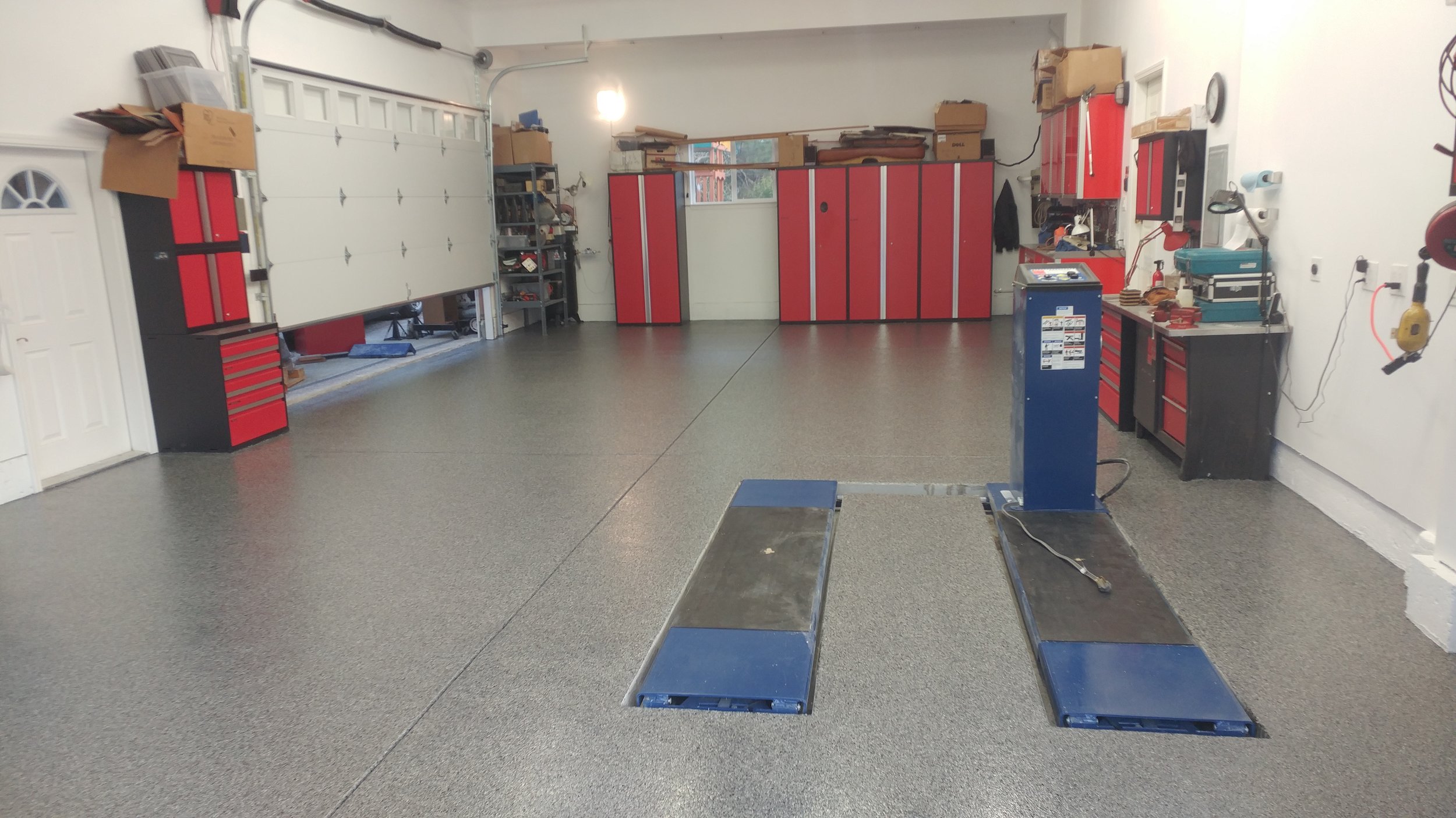 Morega Custom Garage gets a Custom Epoxy Floor to Match