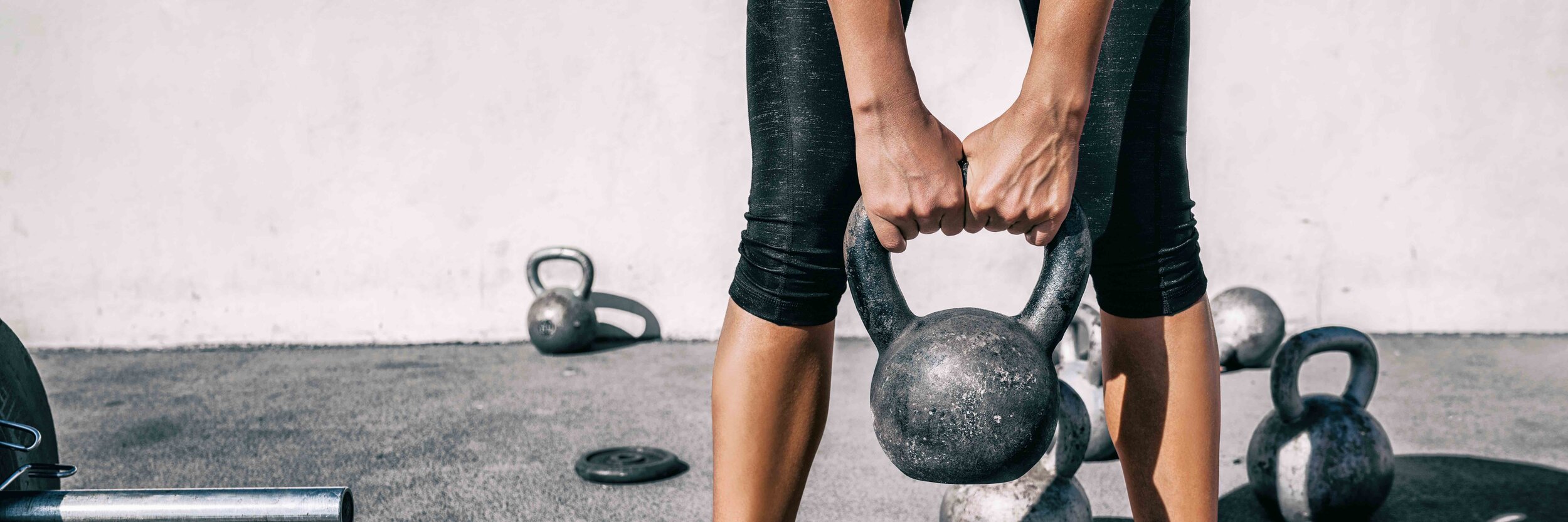 kettlebell_training_woman_optimize_exercise.jpg