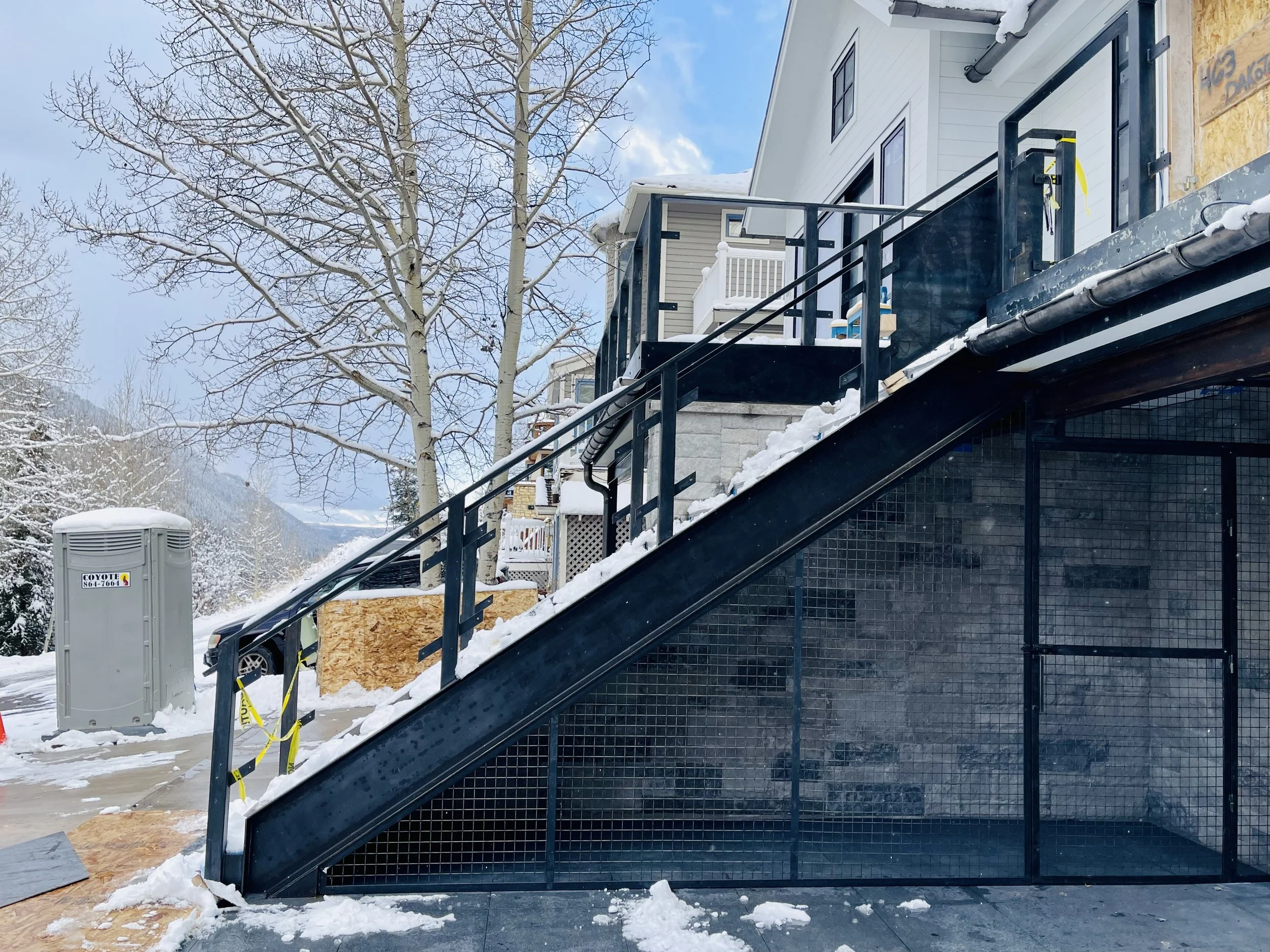 metal-stair-with-trash-enclosure.jpg