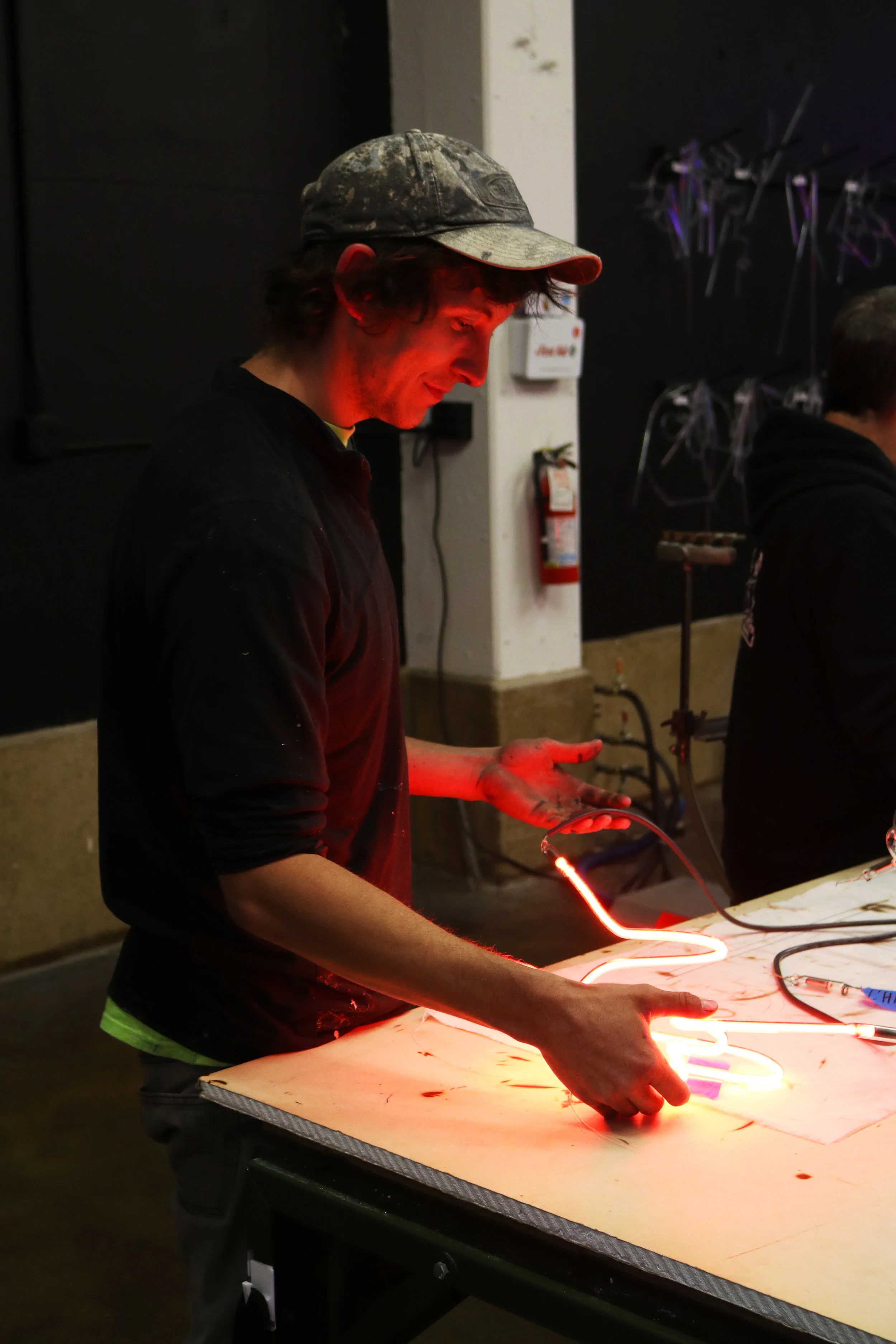 Tuesday student Chris holding one of his final pieces. Image © 2018 Western Neon School of Art.