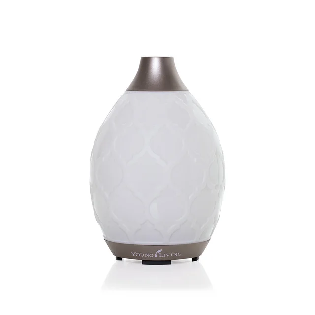 This Moroccan-inspired diffuser just released this summer is my new favorite! Its candelight flicker setting sealed the deal for me but another favorite feature is the three output settings so you can diffuse it on high output to fill a room with natural aroma, medium aroma for smaller rooms, or light intermittent setting which is what I use during the night! It has longer run times than any of Young Living's ultrasonic diffusers and comes with a one-year warranty. 