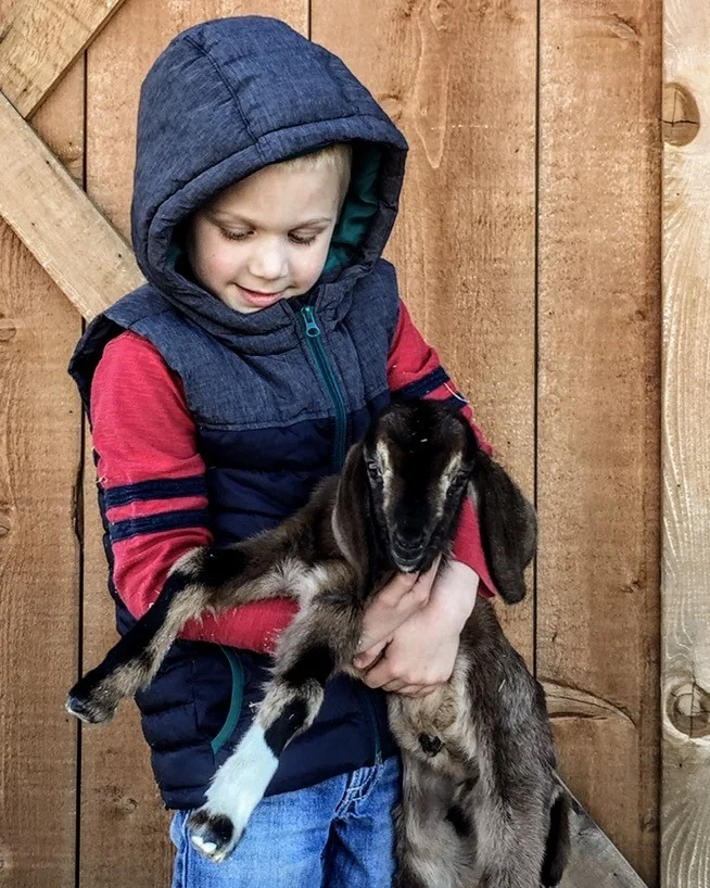 Dr. Holloway’s son takes after his mom in her love of small ruminants.
