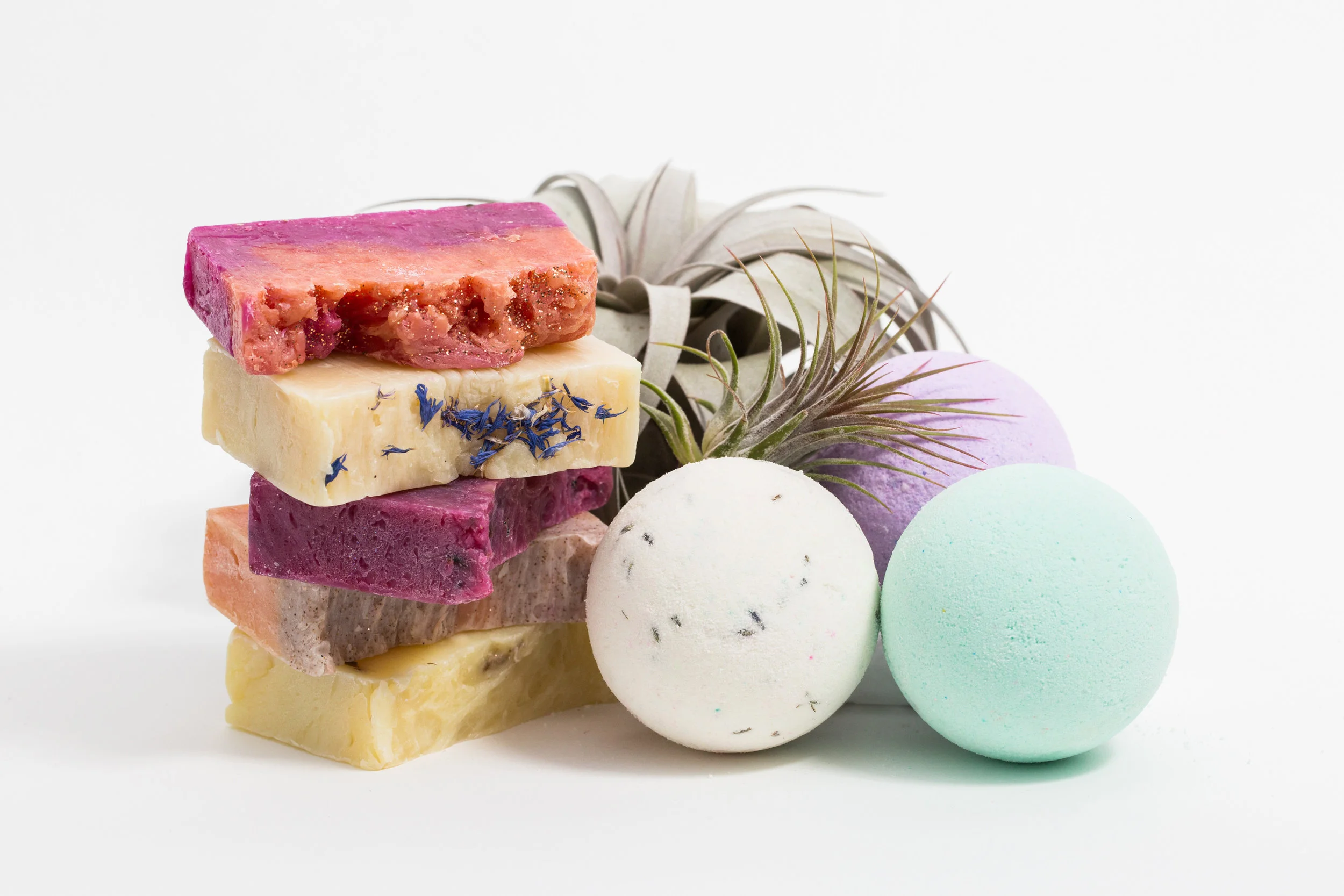 Hand crafted soaps and bath bombs by Burlap and Twine