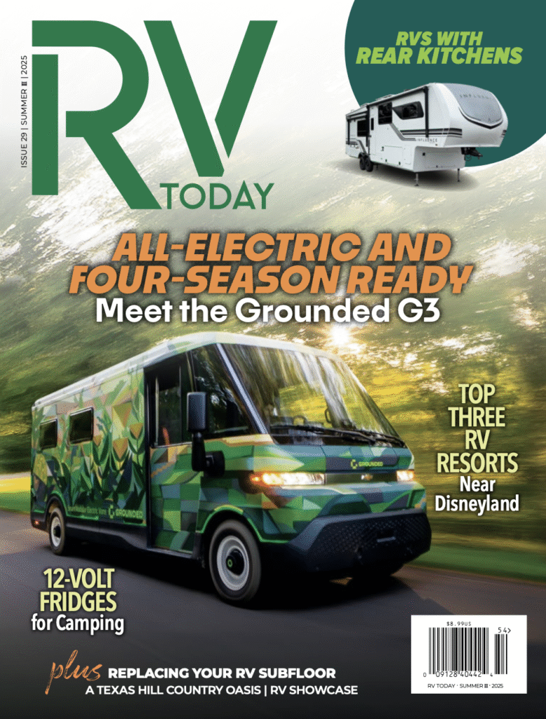Cover of RV Today magazine's summer 2025 issue featuring an all-electric Grounded G3 RV, a green and black electric RV with a geometric pattern, driving through a forested landscape with sunlight peeking through trees. The cover also highlights rear kitchens, top RV resorts near Disneyland, 12-volt fridges for camping, and replacing RV subfloor.
