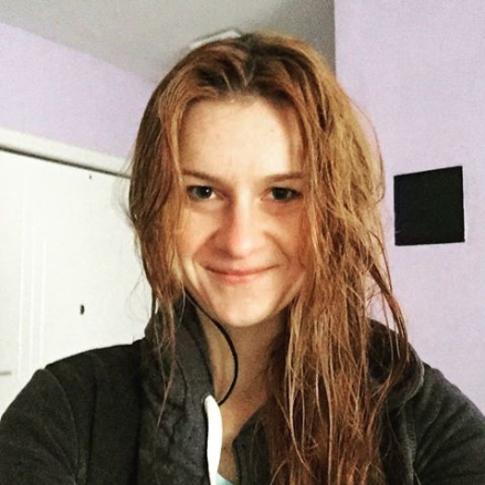 Butina wet hair photo smile.png