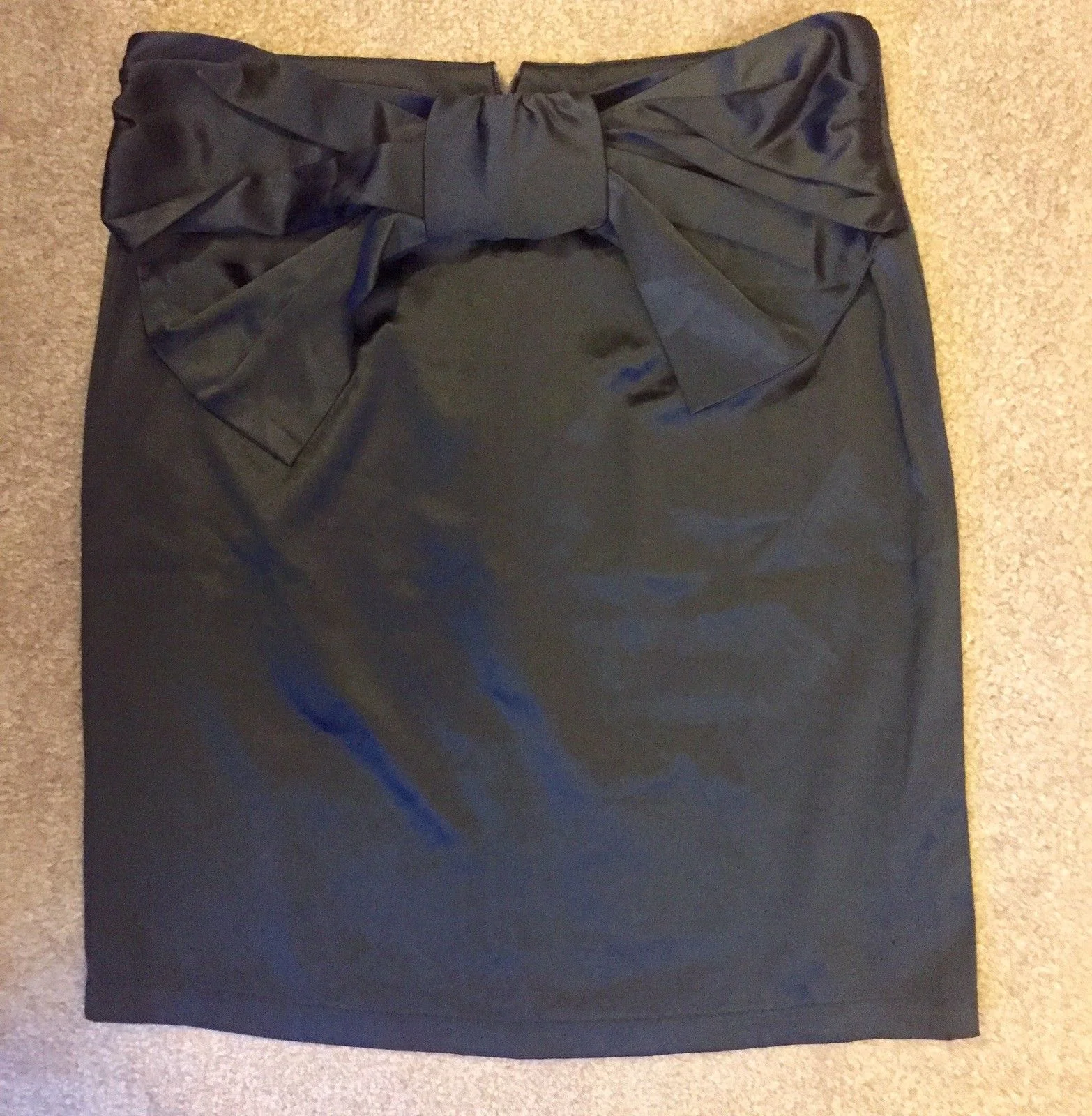 Chanel Mini Skirt with Black Bow (PLEASE NOTE: My photography skills have gotten MUCH better since I first began... also, I researched and researched this piece to make sure it wasn't a fake.) Bought: $4.99 (Goodwill) Listed: $49.99 Sold: $40 Profit: $35.01 (minus eBay's cut)