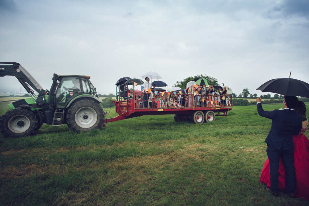 Sophie & Mike Wedding at Hunstile Farm - Tractor Transports Guests