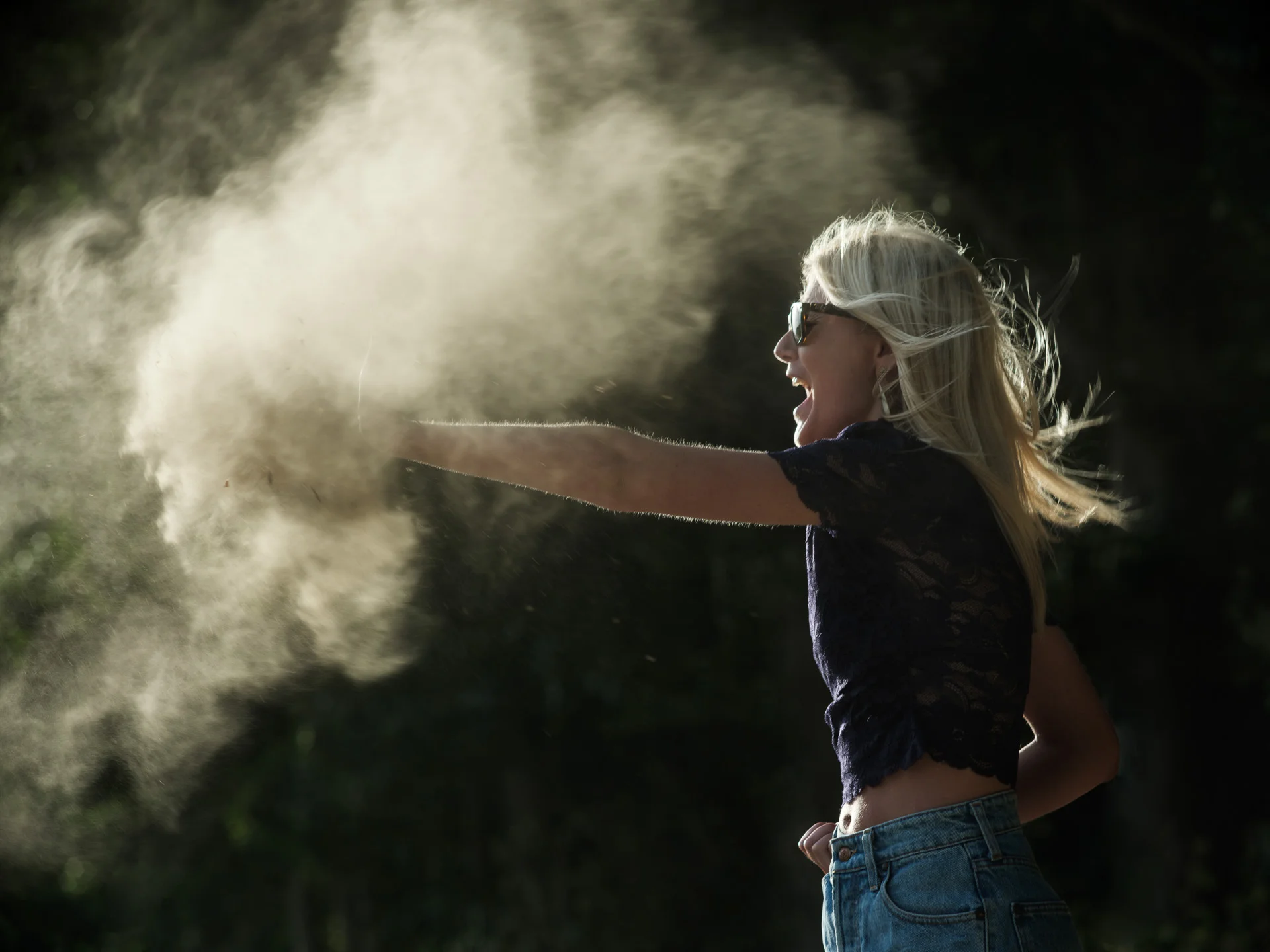 FUJIFILM GFX-50S with Minolta Rokkor 200mm f/3.5 - iso 200 - f/5.6 - 1/250 Time to play a bit with this dust. Wilhelm released a handful of dust just outside of the frame, Nelle smashed it and I took the picture. It took us a couple of tries and mouthfulls of dust. 