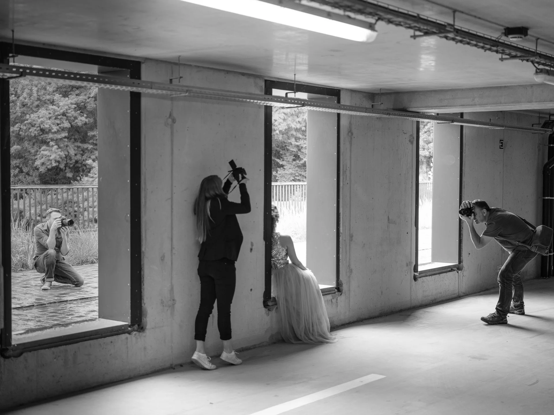 From left to right: Jef taking a behind the scenes shot - Laura looking for a creative angle - Jasmin being her elegant self - Frank looking for his next composition