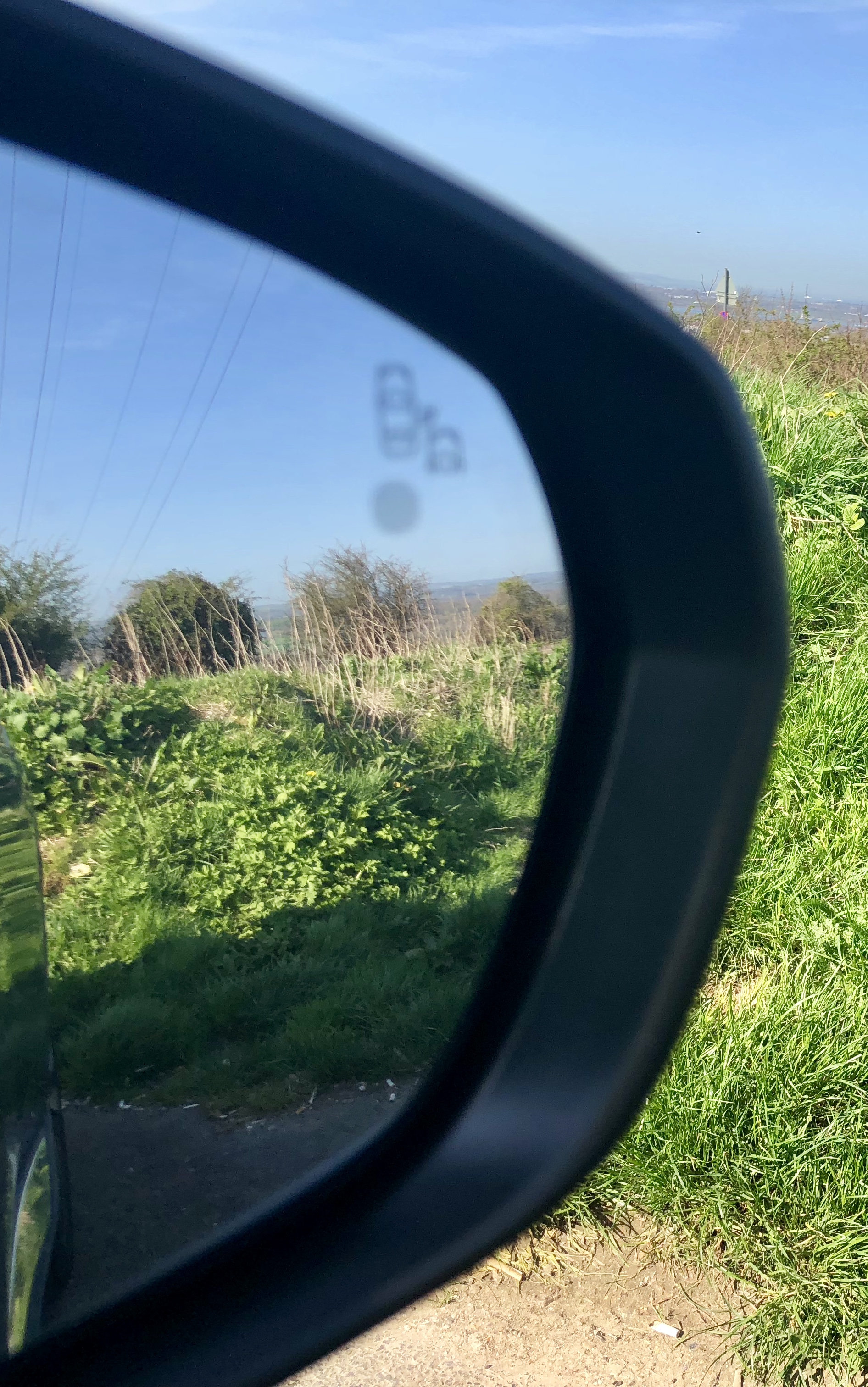 Blind spot recognition, in the door mirrors.