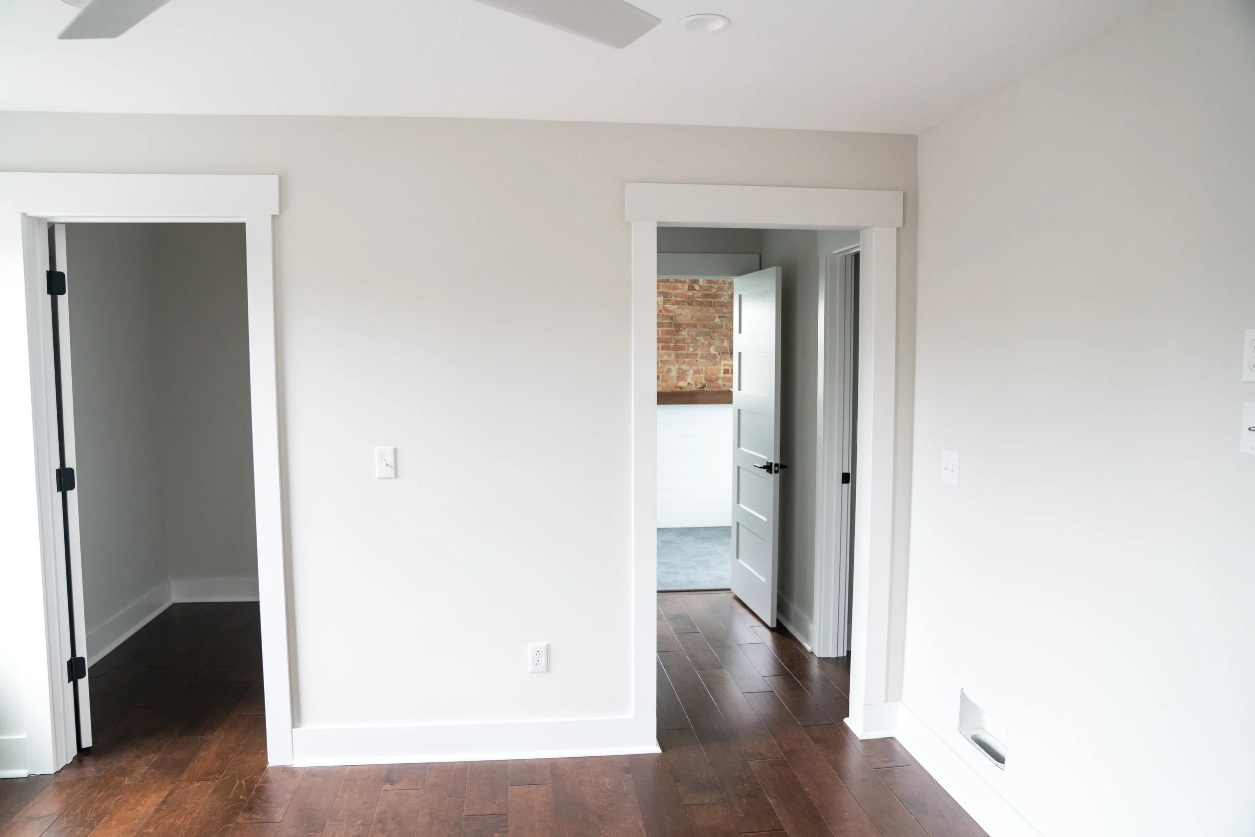 After: the door on the left is a walk-in closet; the hallway on the right leads to another closet on the left, a water closet on the right, and the master bathroom at the end.