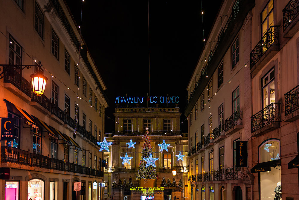 Illuminated main entrance to the Grandes Armazens do Chiado