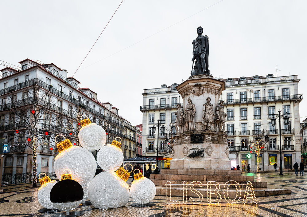 Illuminated Luis de Camoes square and statue 