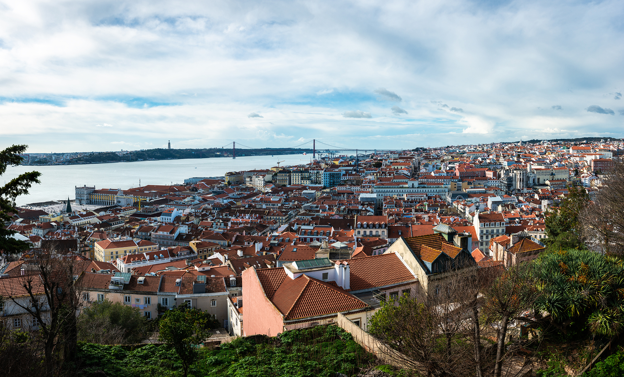 Skyline of Lisbon, with Almada and the 25 de Abril bridge over the Tagus river in the background