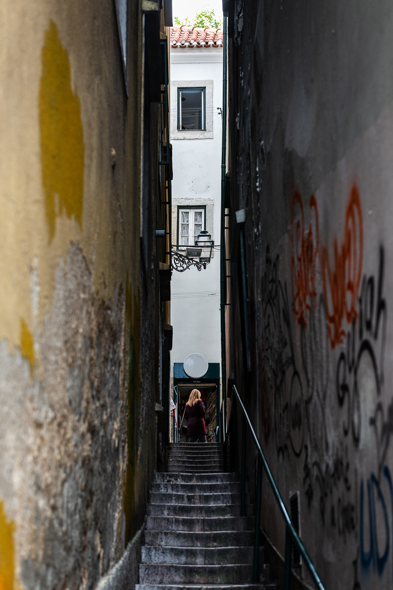 Traditional narrow cobblestone street and staircase in the Alfama district