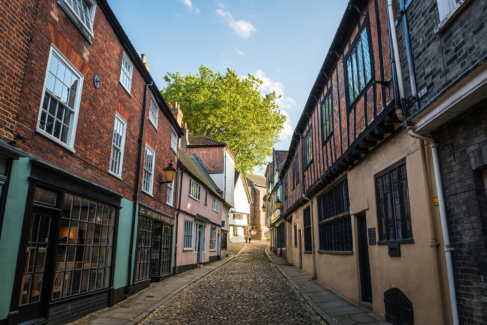 Cobblestone street and traditional houses in downtown Norwich