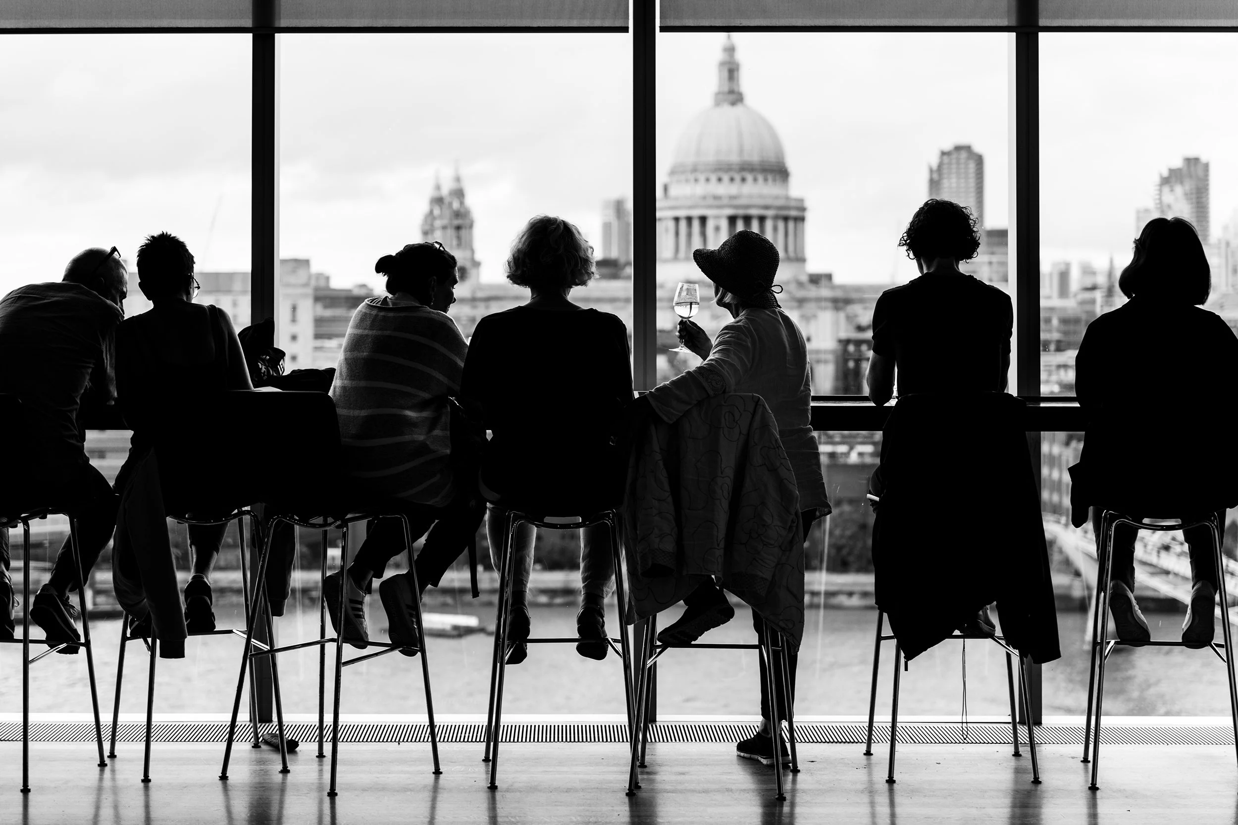 Silhouette of people enyoing the view of London
