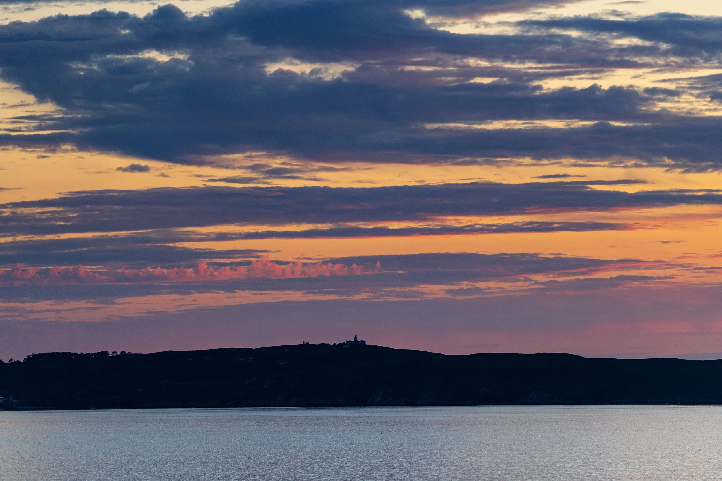 unset falling over Ons Island in Galicia, Spain, as seen from the air