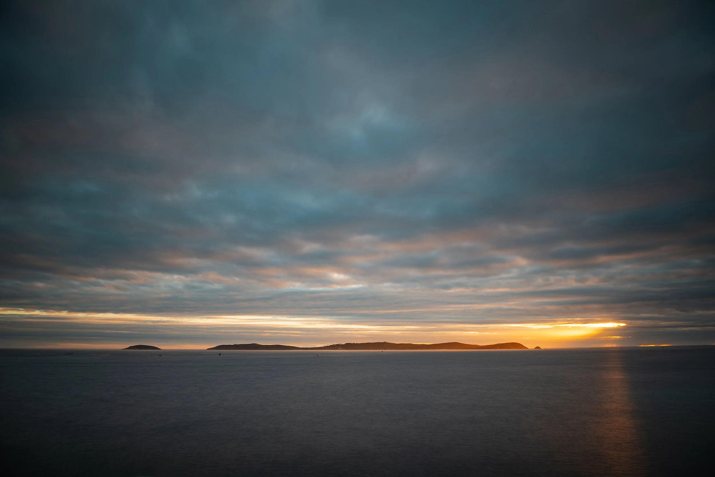 Silhouette of Ons Island in Galicia at dusk, Spain