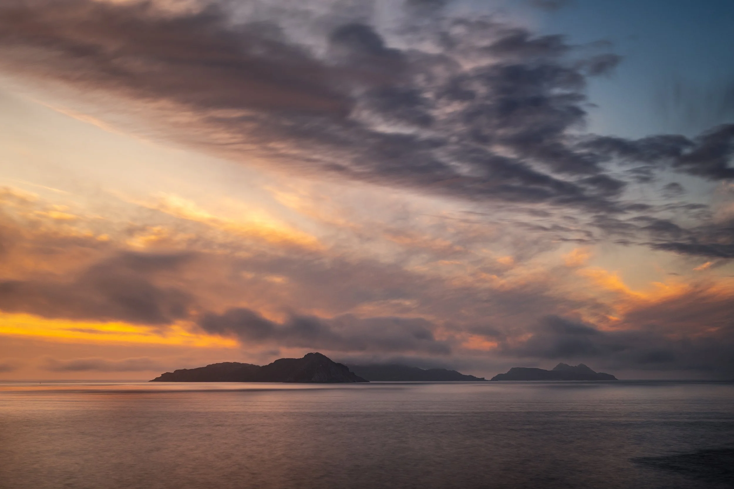 Silhouette of the Cies Islands in Galicia at dusk, Spain