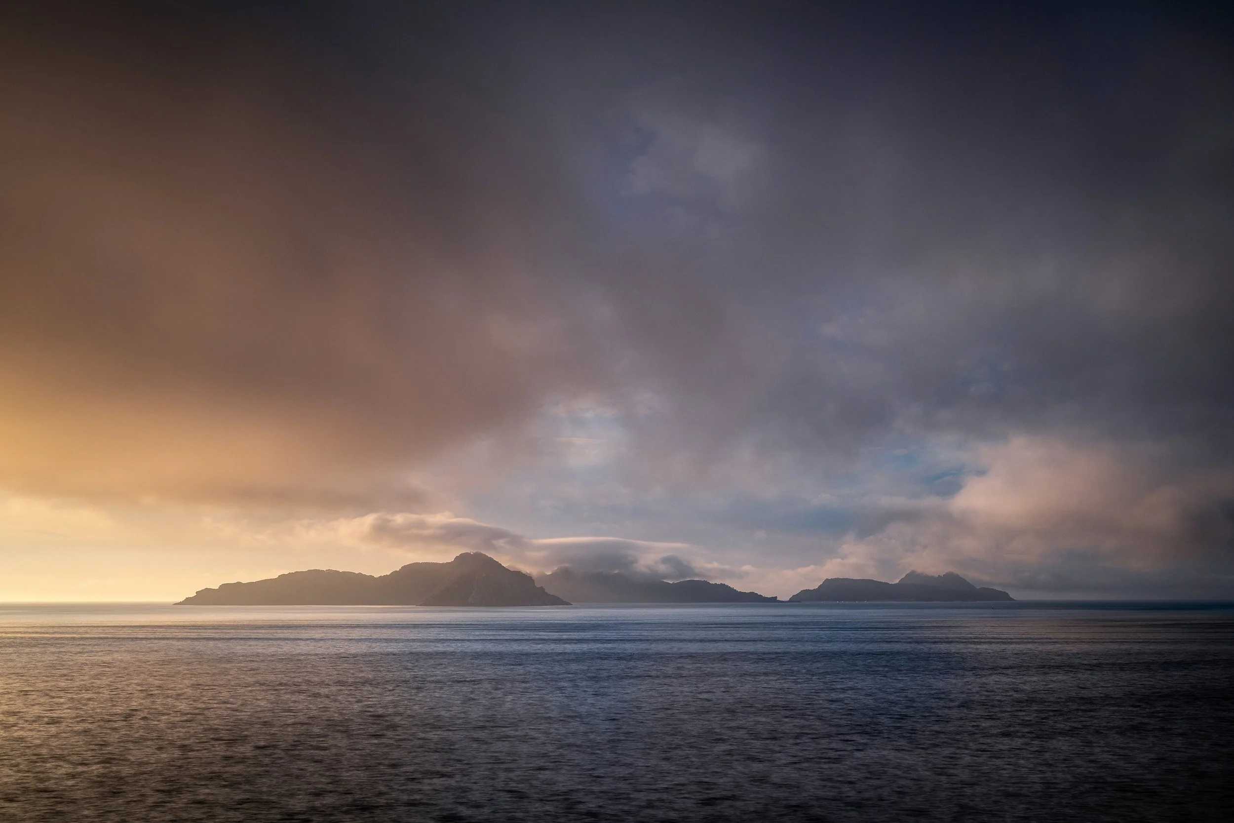 Silhouette of the Cies Islands in Galicia at dusk, Spain