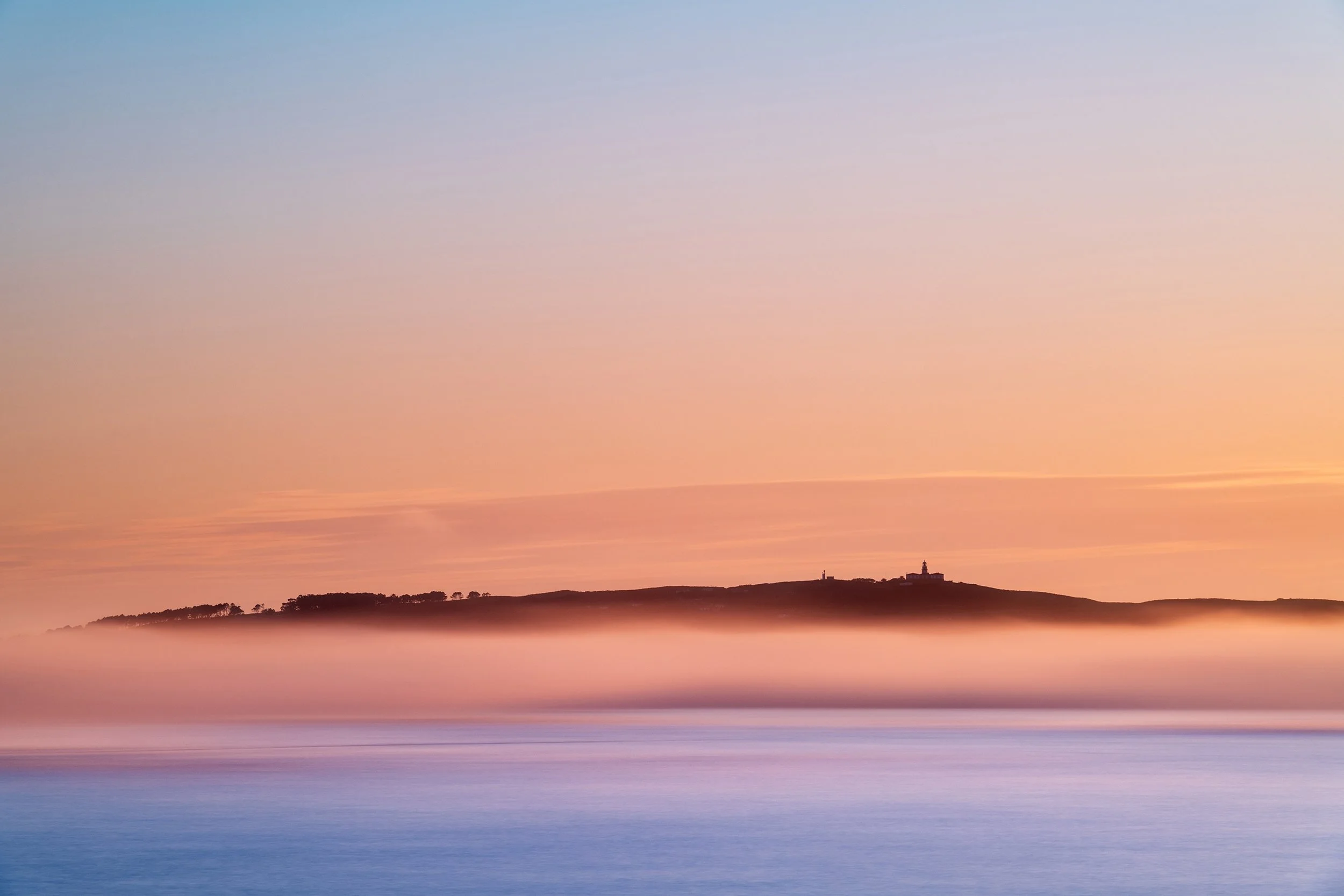 Ons Islands in Galicia under heavy fog, Spain