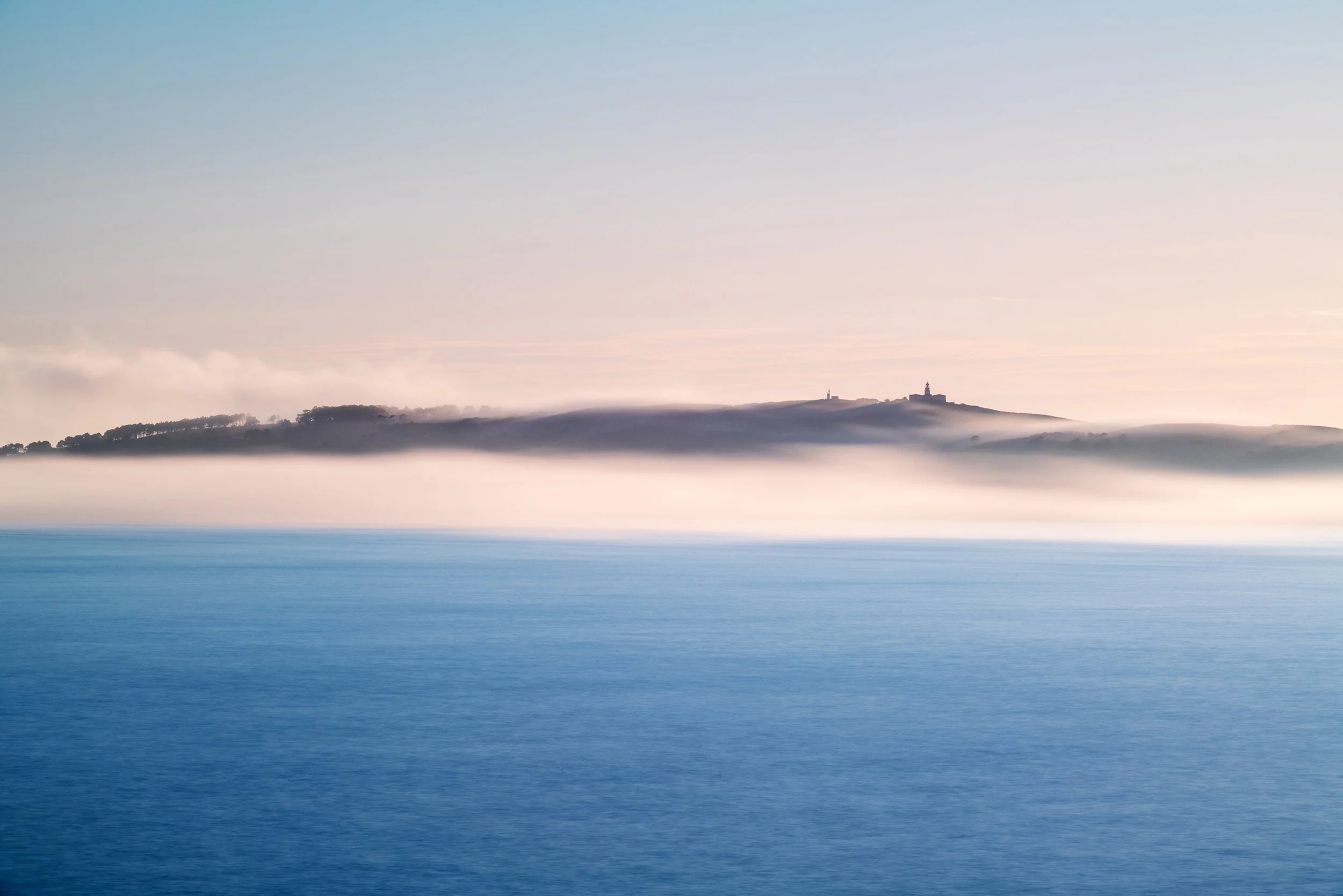 Ons Islands in Galicia under heavy fog, Spain