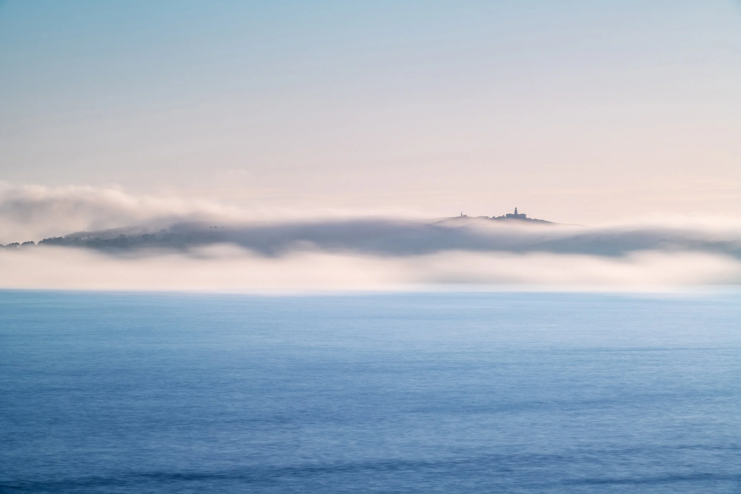 Ons Islands in Galicia under heavy fog, Spain