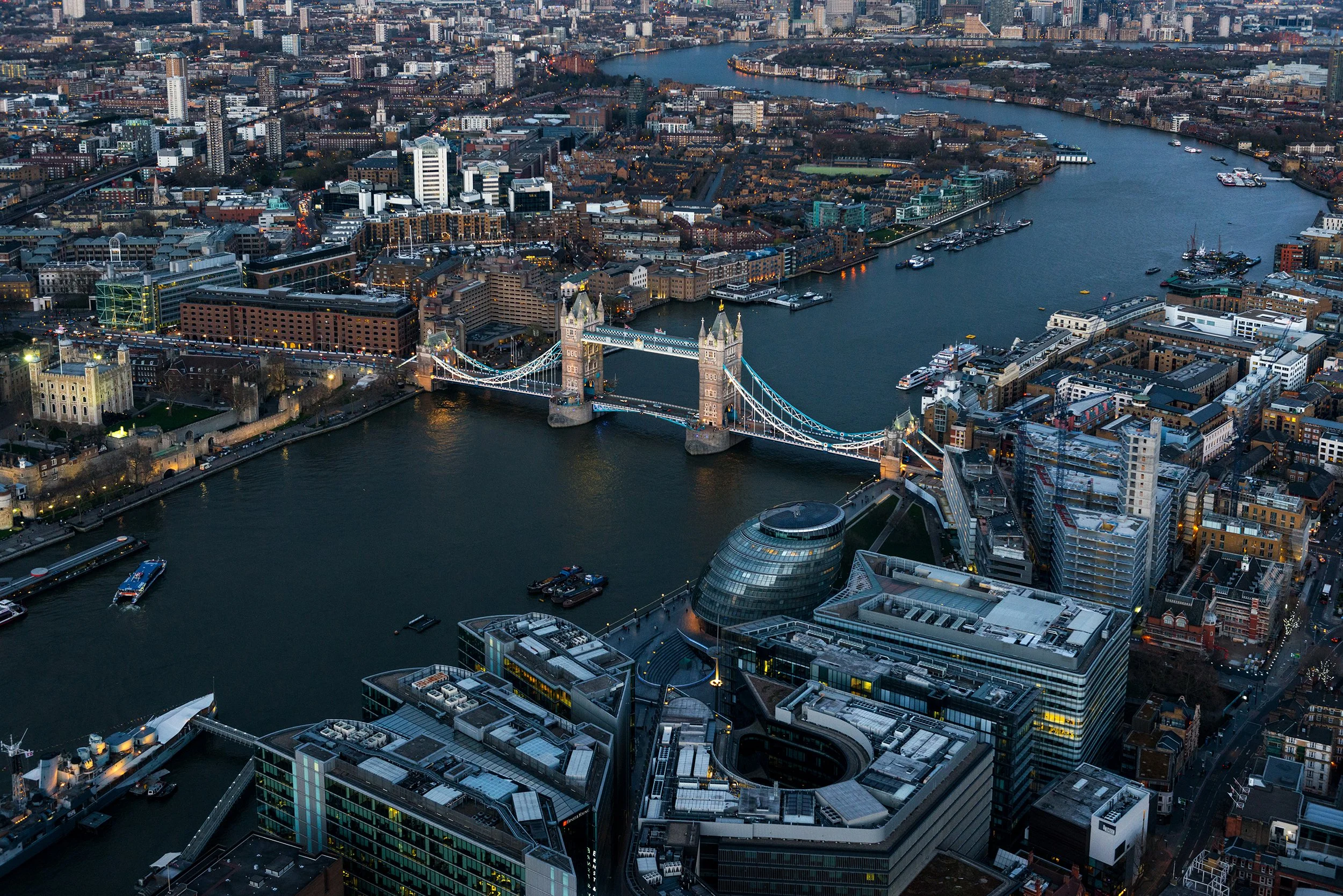 Illuminated night view of London's River Thames and London Bridge