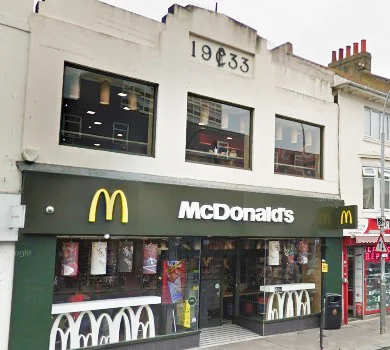 Police charge a woman for criminal damage in McDonald's 