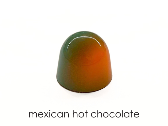 Vietnamese cinnamon white chocolate ganache in dark chocolate