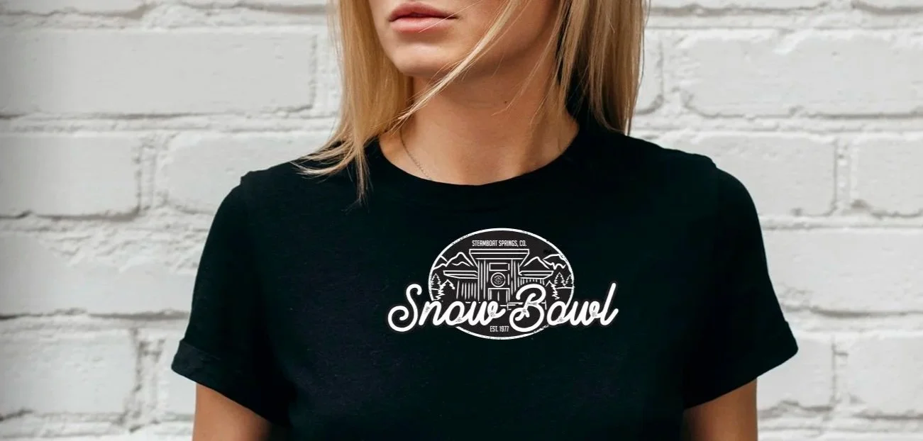 Snow Bowl logo printed on a black t-shirt