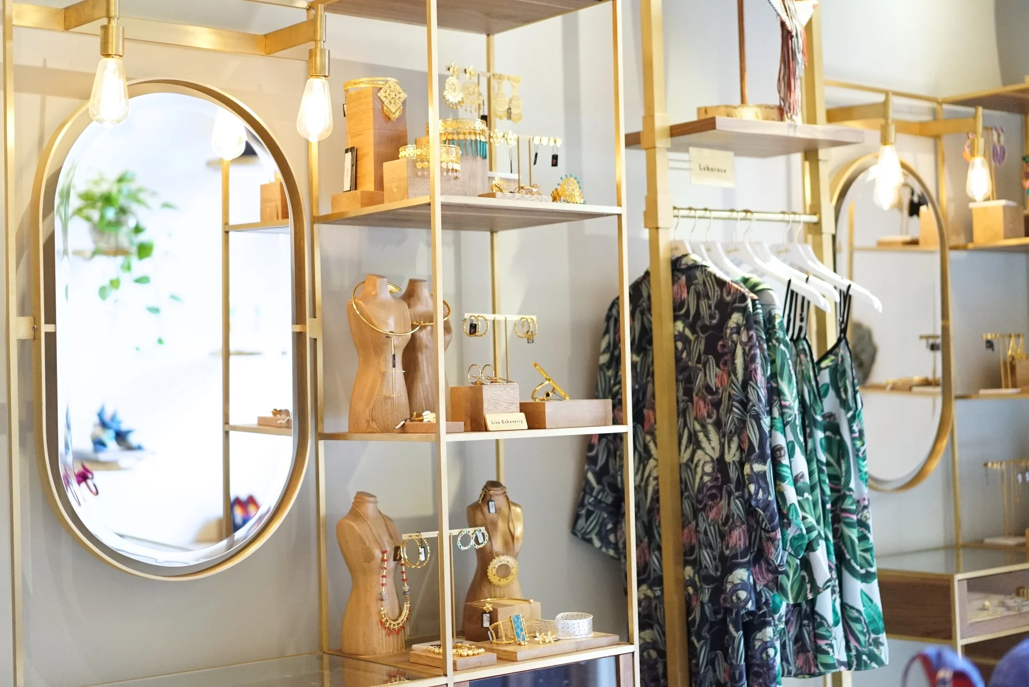 Agua de León's walls are accented with bronze racks for Lobo Rosa , Liza Echeverry , and other prominent designers.